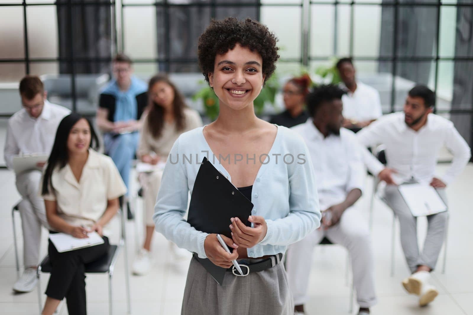 Businesswoman explaining new ideas and strategy in seminar