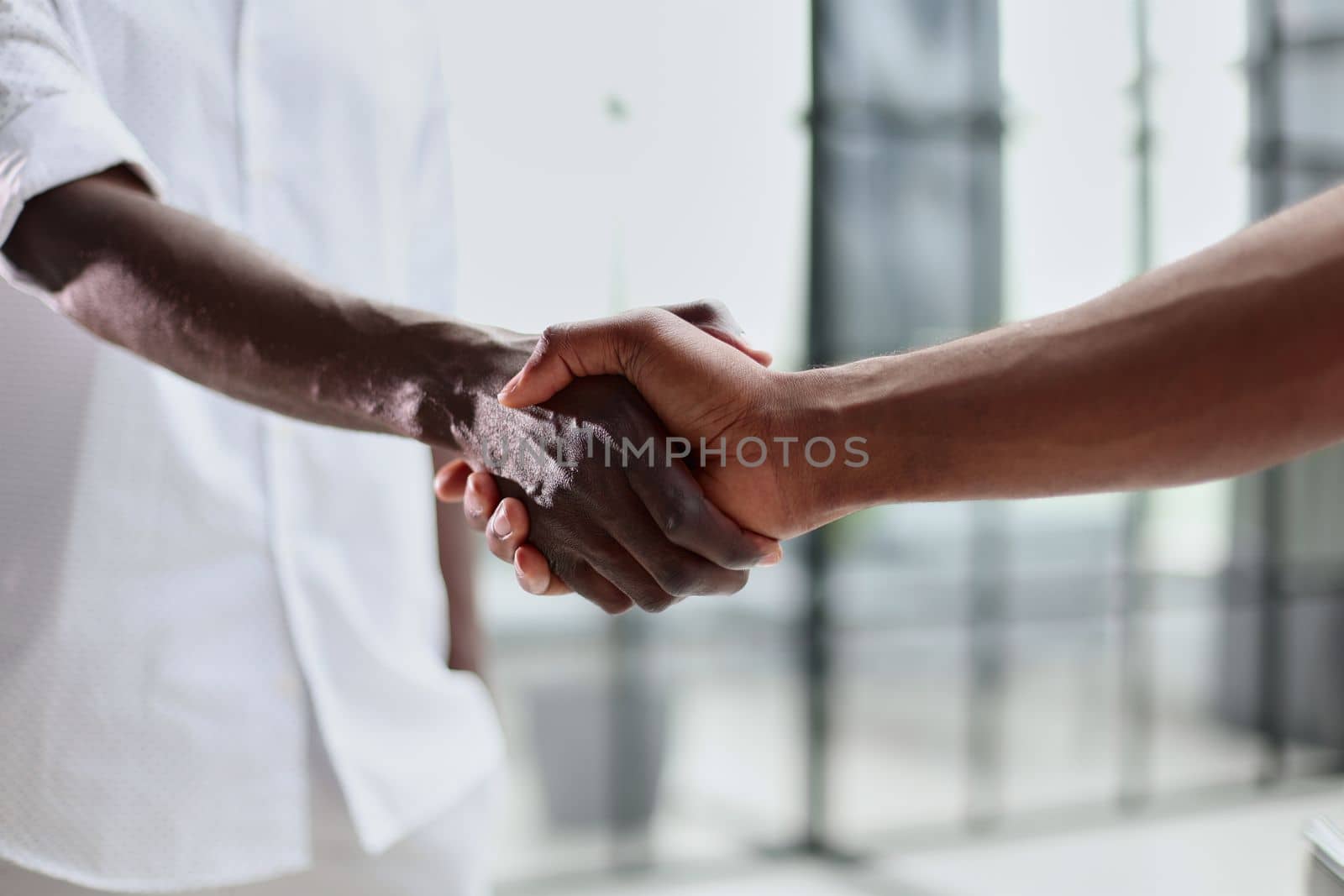 Businessman handshake for teamwork of business merger and acquisition,successful negotiate,hand shake, by Prosto