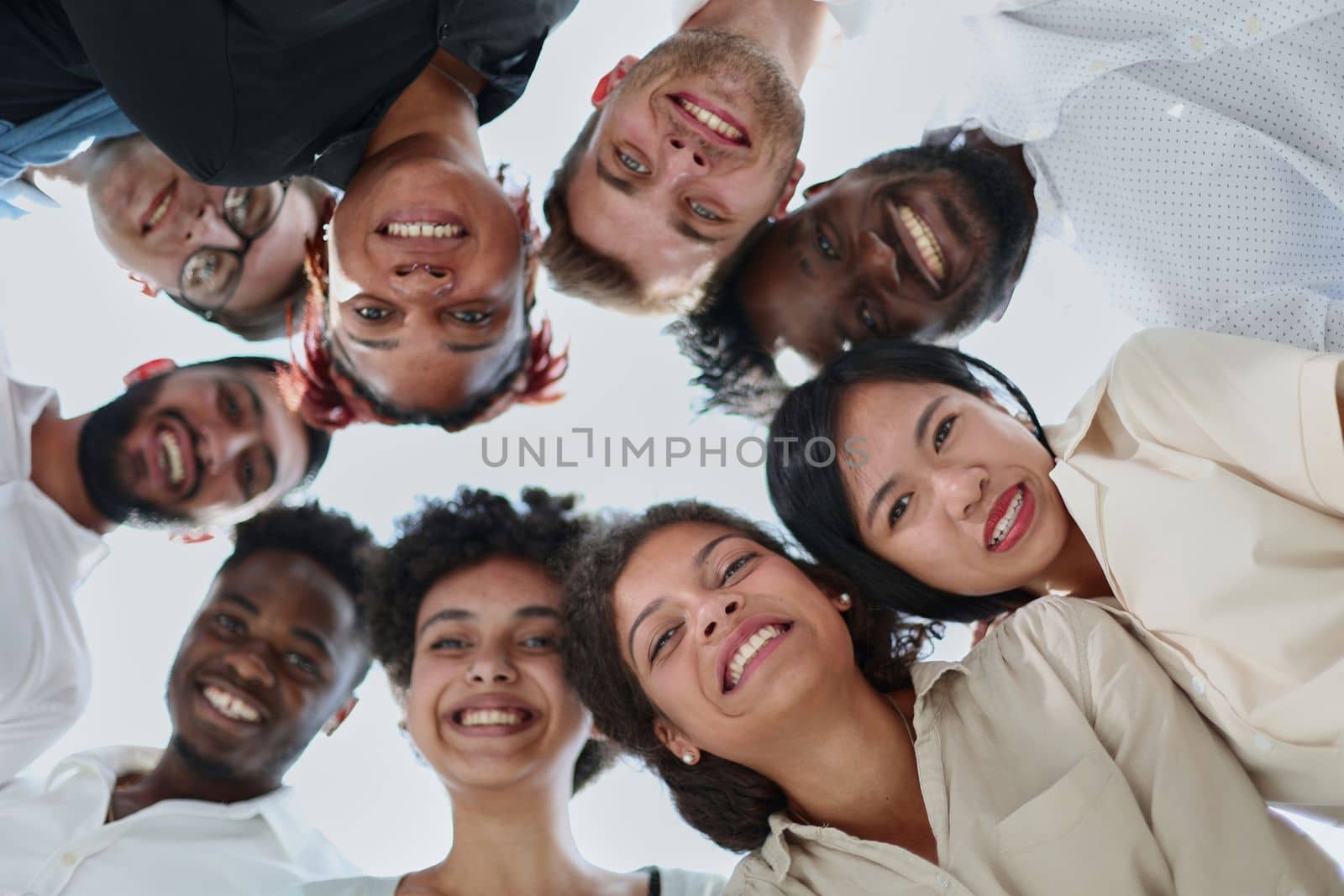 Selfie of young smiling businessmen having fun together