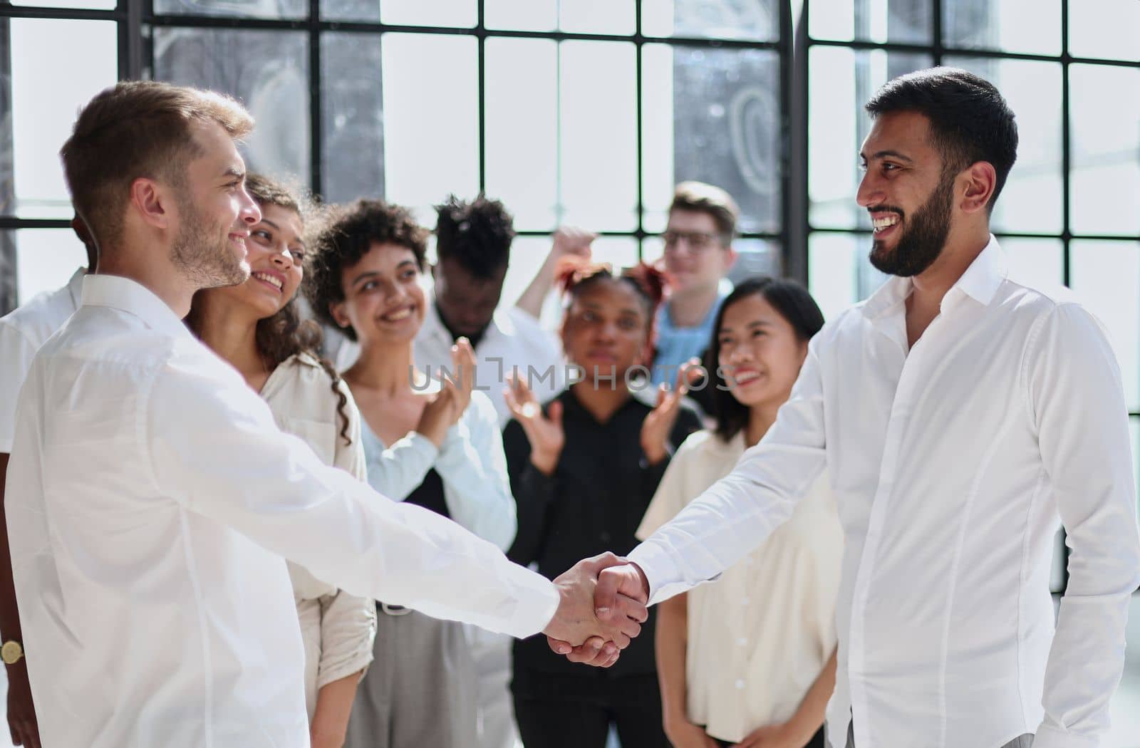 Business people shaking hands, finishing up a meeting