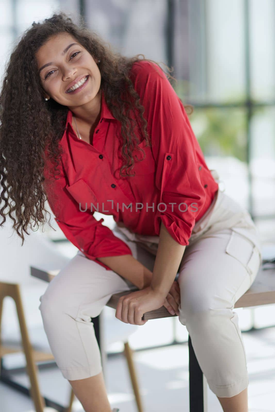 Attractive young businesswoman with a happy smile