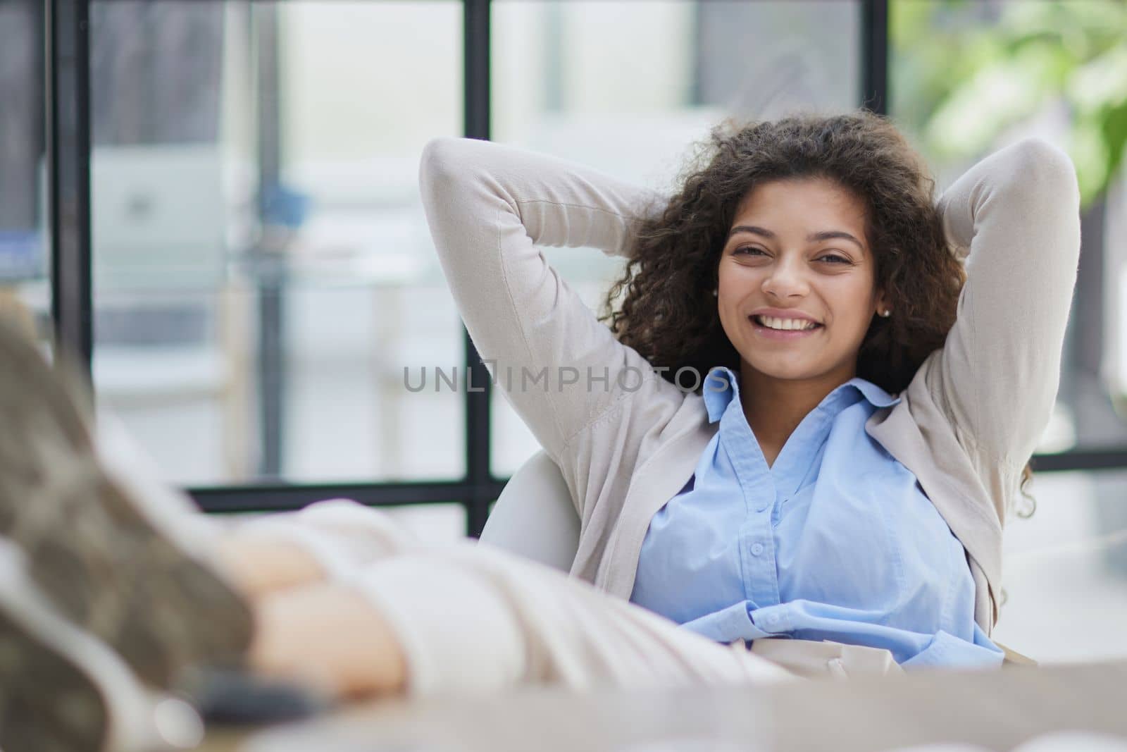 Tired businesswoman sleeping with closed eyes at workplace in office
