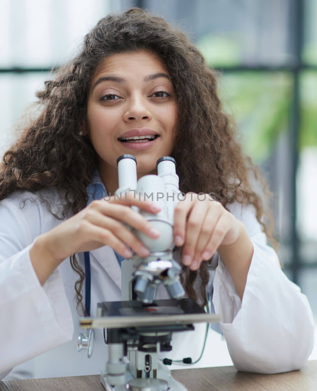 Female scientist researcher conducting an experiment in a labora