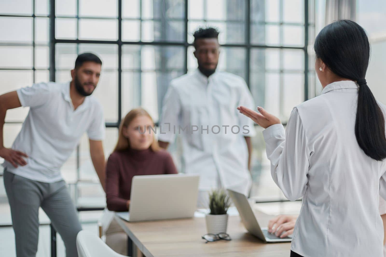 Businessmen and businesswomen talking during a meeting