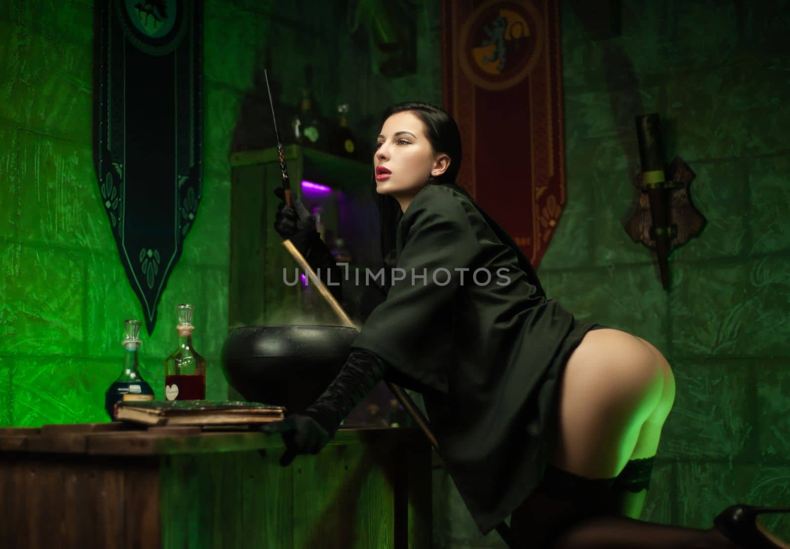 sexy girl in a witch costume with sexy buttocks