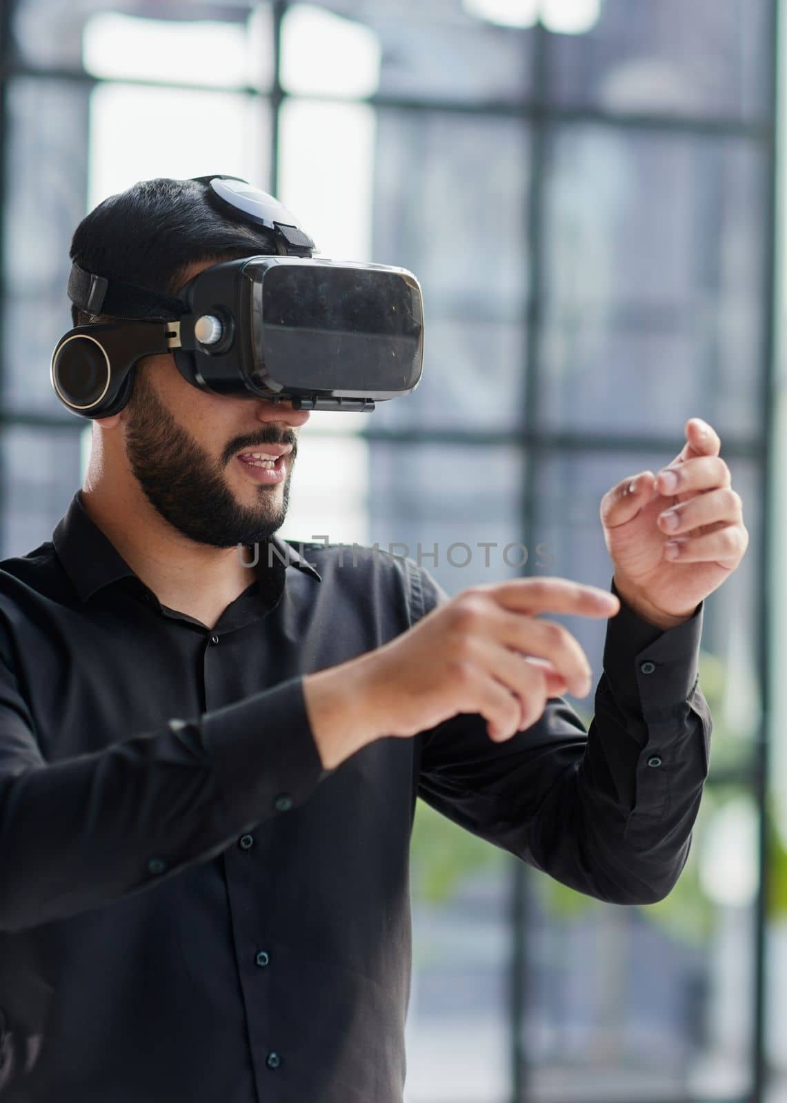 Businessman with virtual reality headset at office