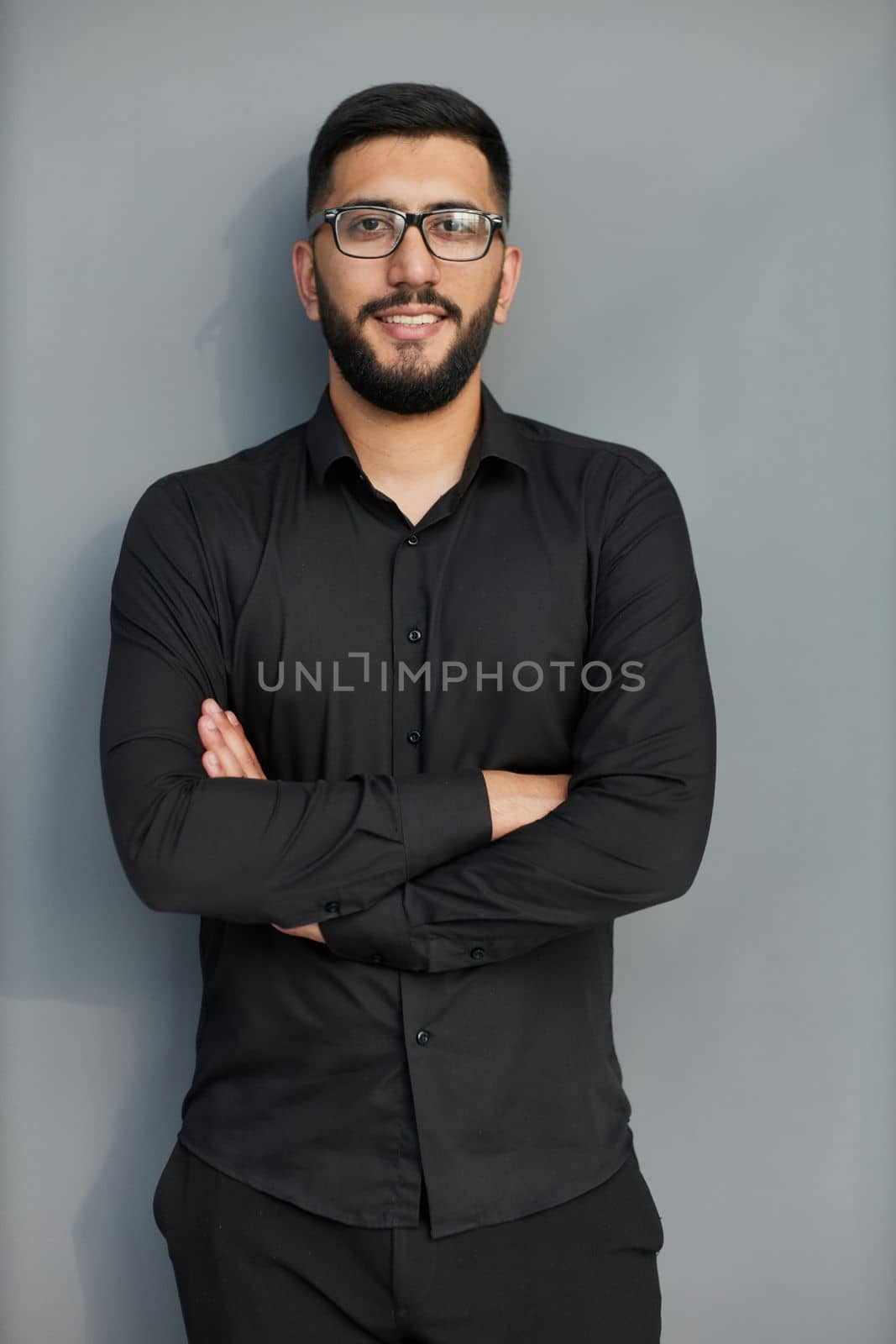 Business Concept - Portrait Handsome Business man holding hands with confident face. White Background