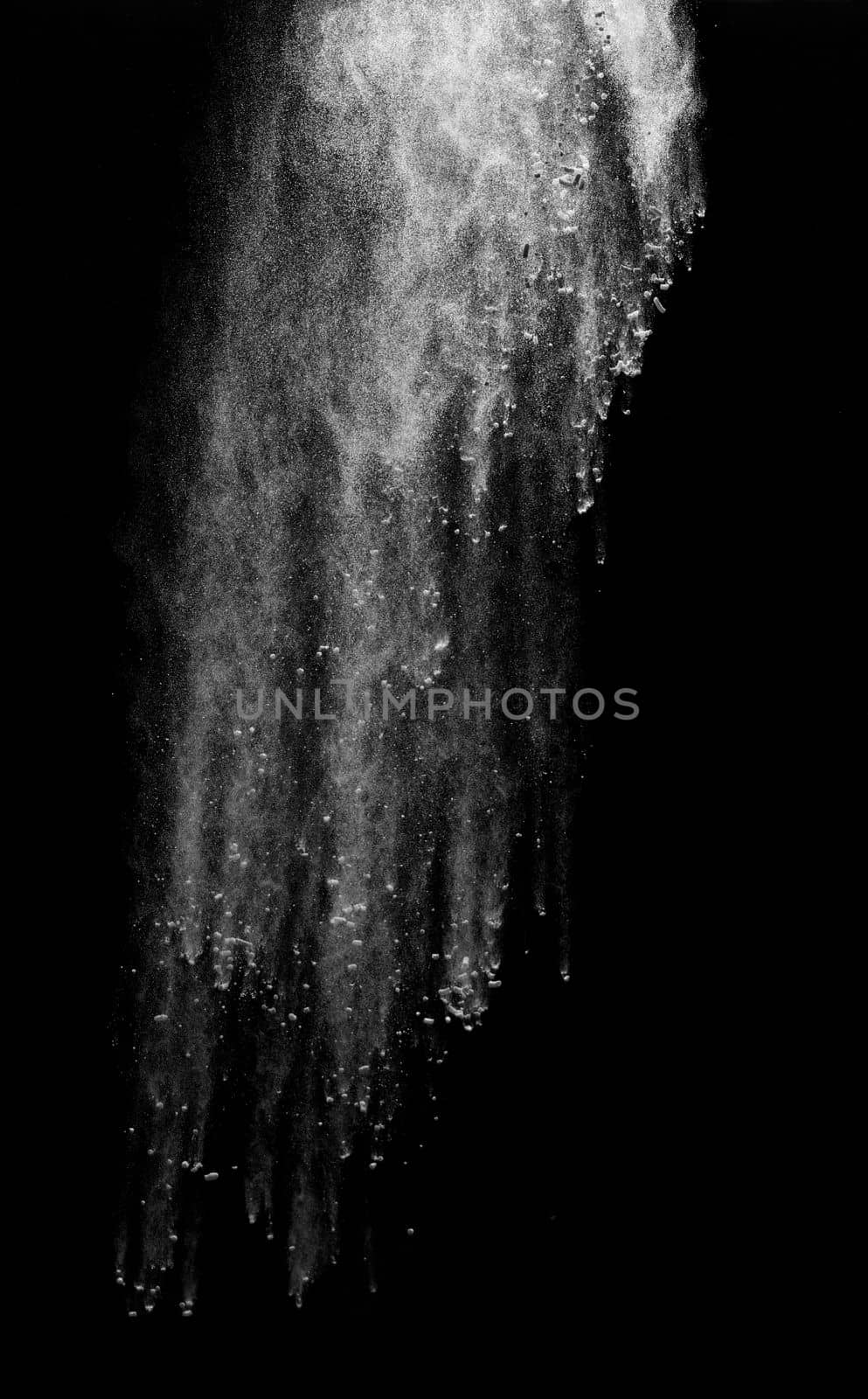 close up of powder or flour on black background