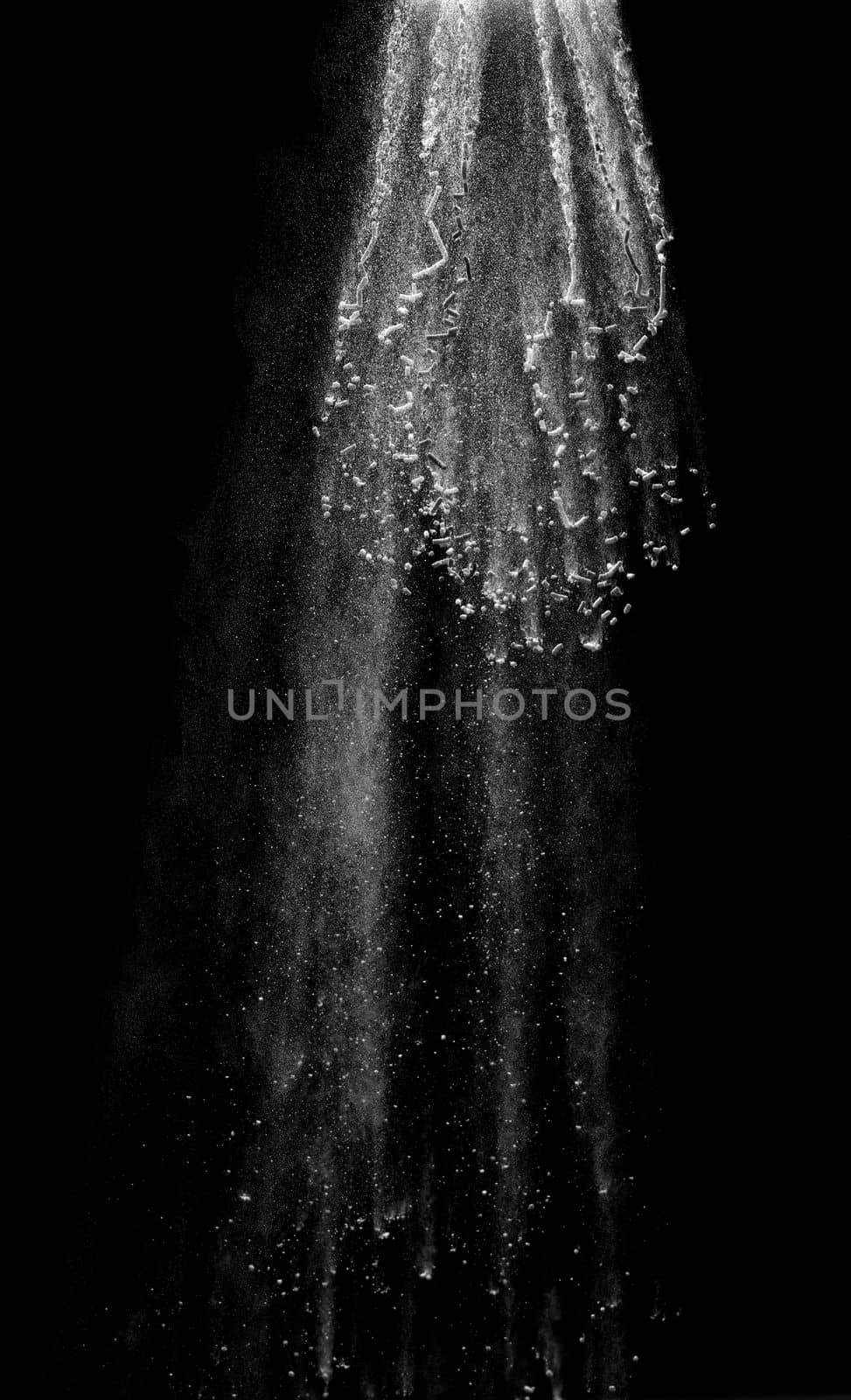 close up of powder or flour on black background