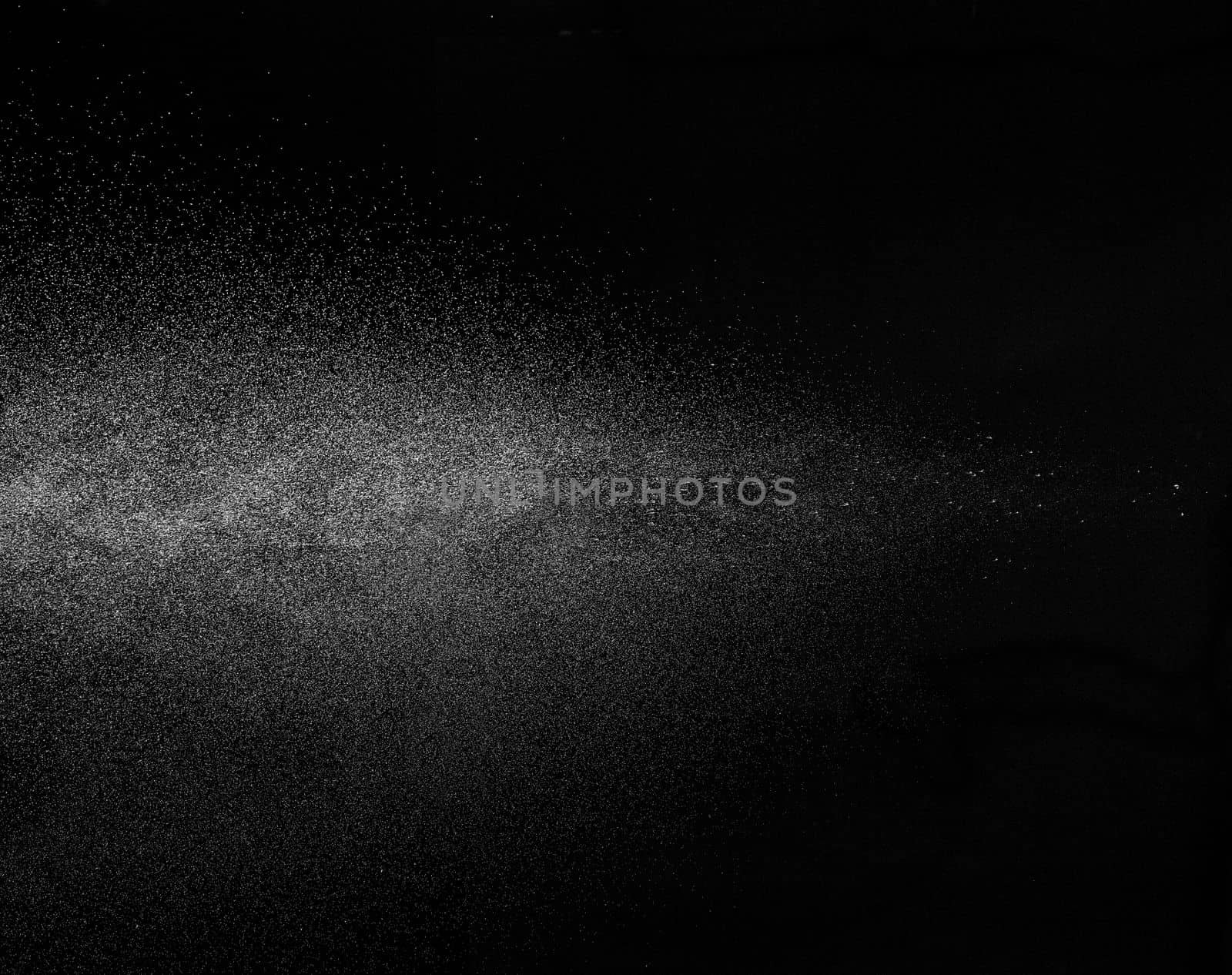 close up of spray water on black background