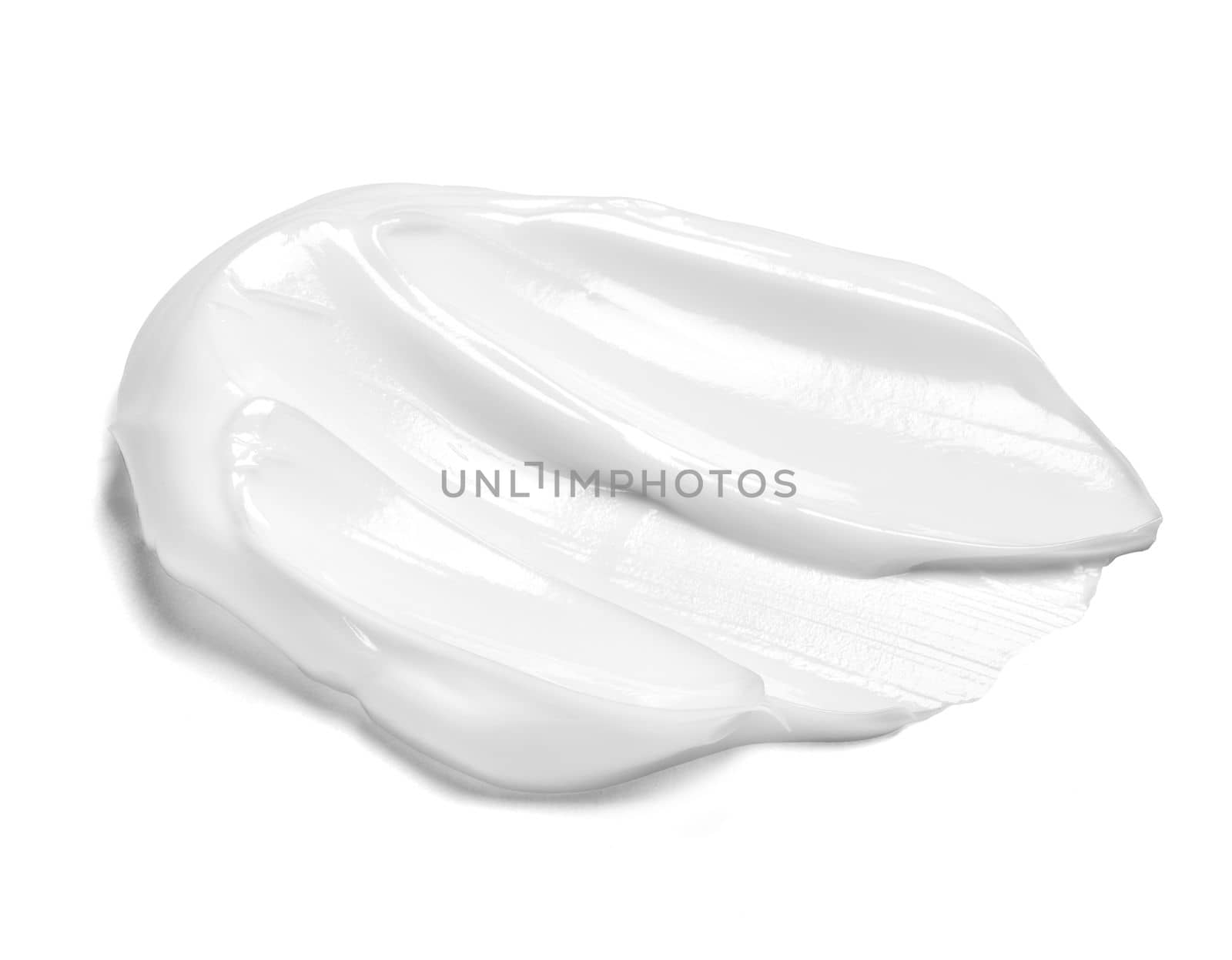 close up of a white cream sample on white background