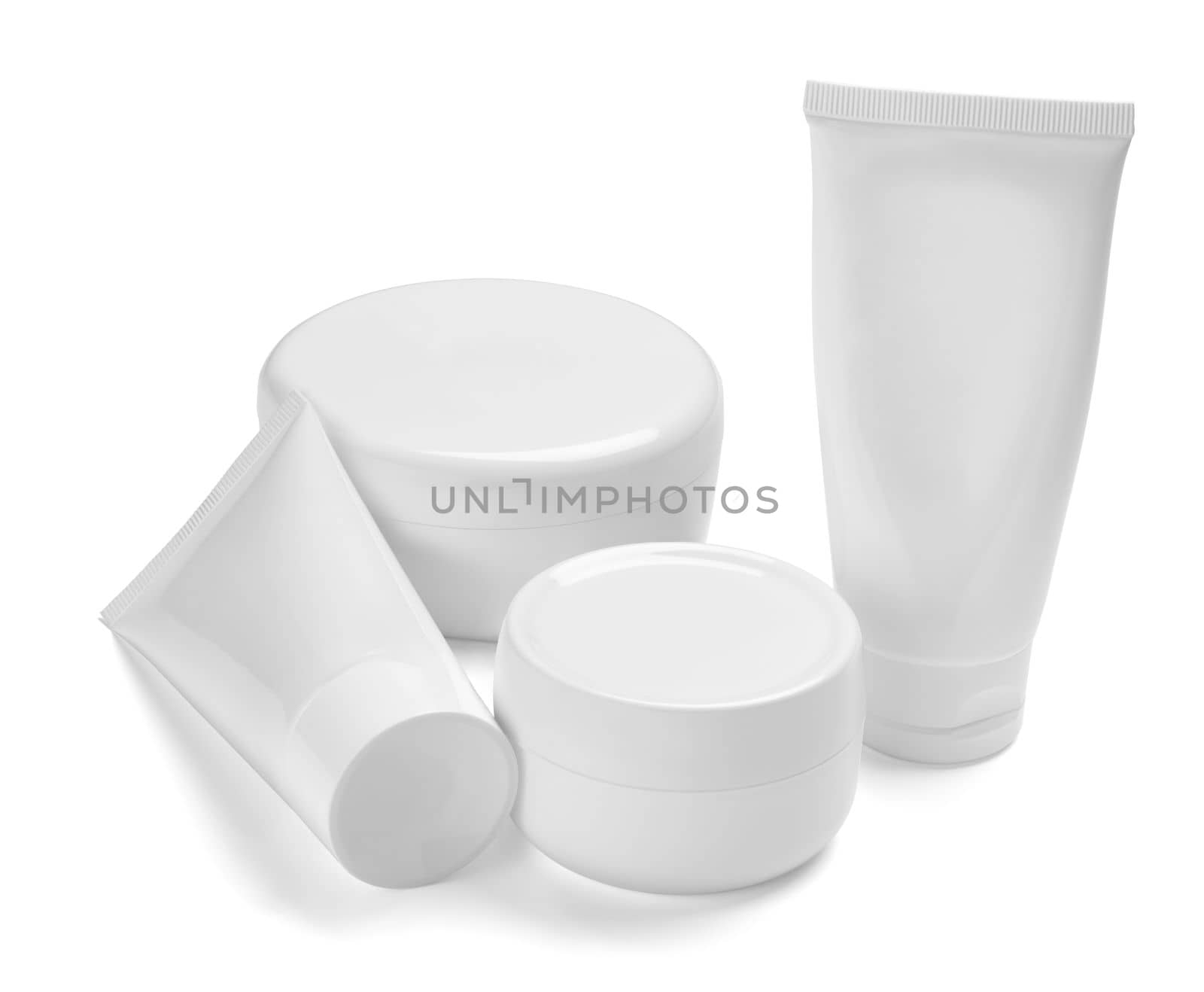 close up of a white beauty cream container and tube on white background