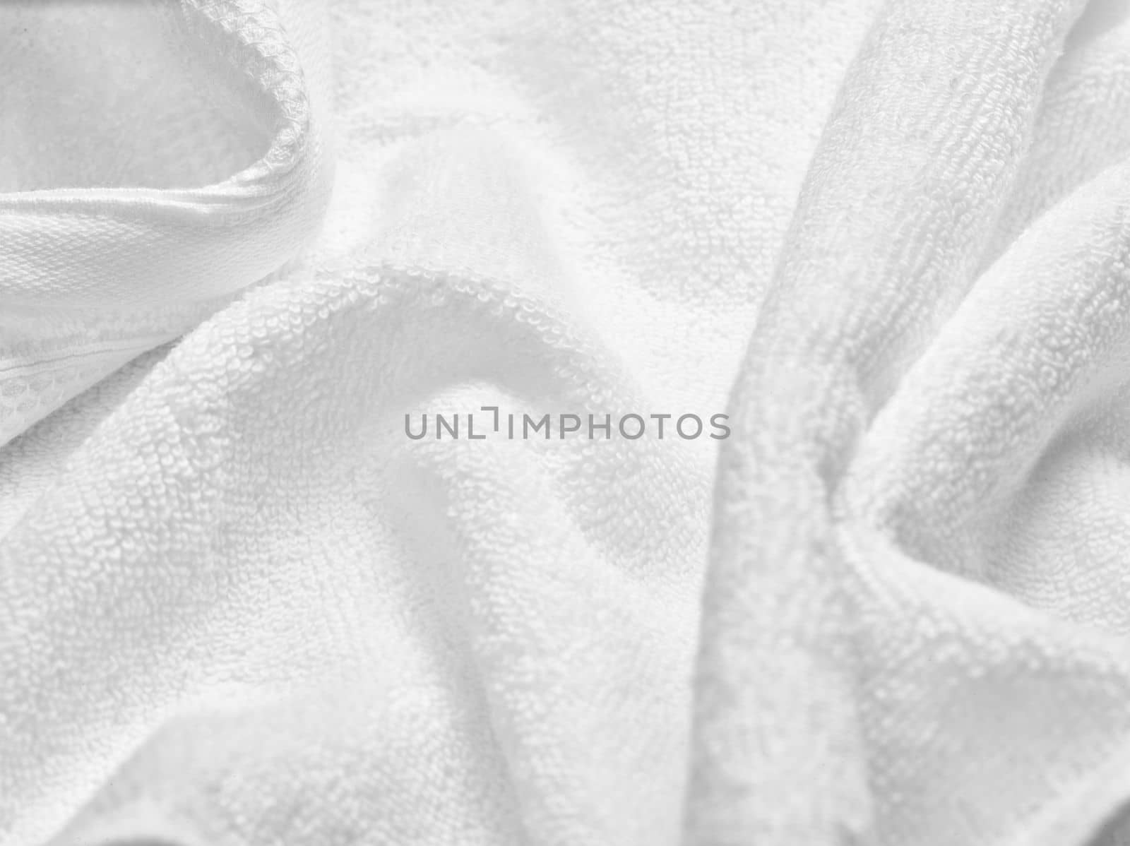 close up of a white towel bathroom on white background