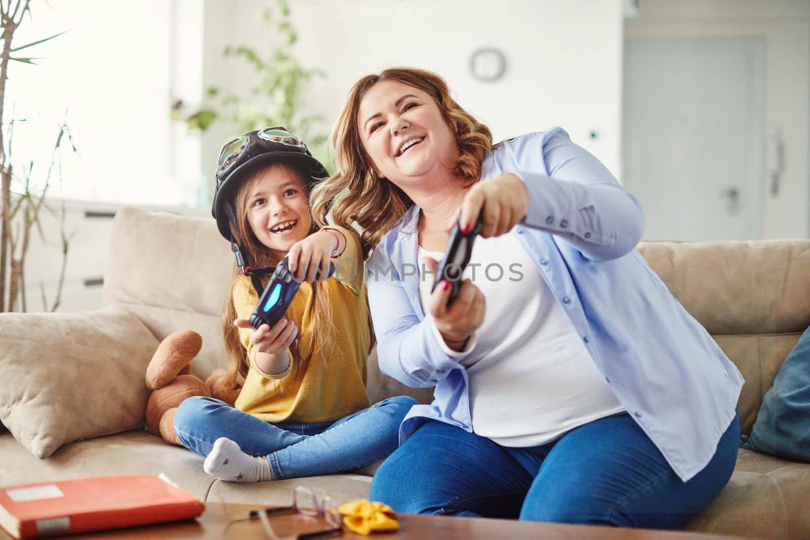 child daughter mother family happy playing console kid childhood by Picsfive