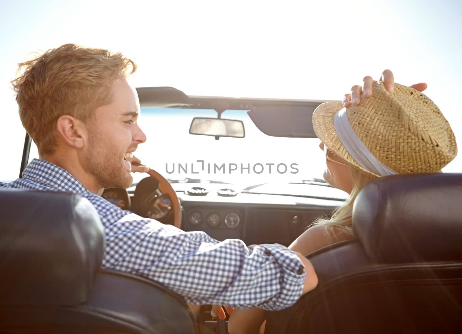 Car road trip, travel and back of couple on bonding holiday adventure, transportation journey or fun summer vacation. Love flare, convertible automobile and driver driving on Canada countryside tour.