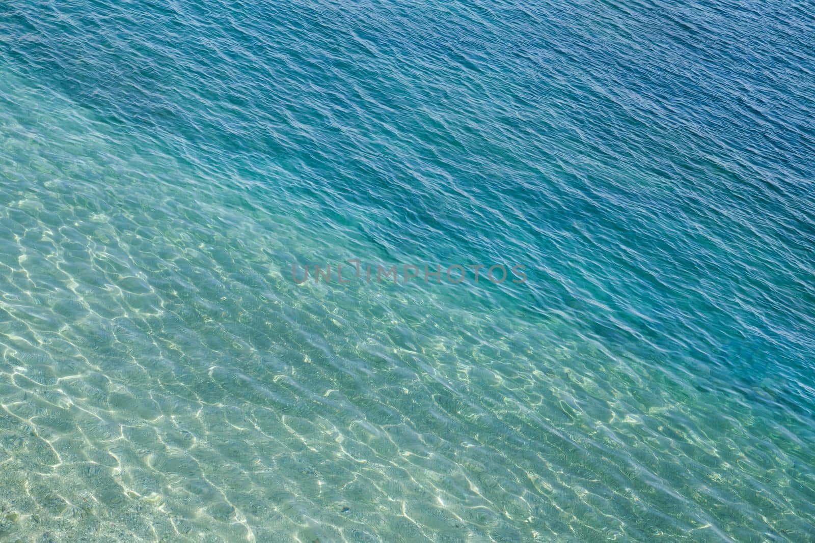 Seawater surface, sun glare on water surface, diagonal lines by Laguna781