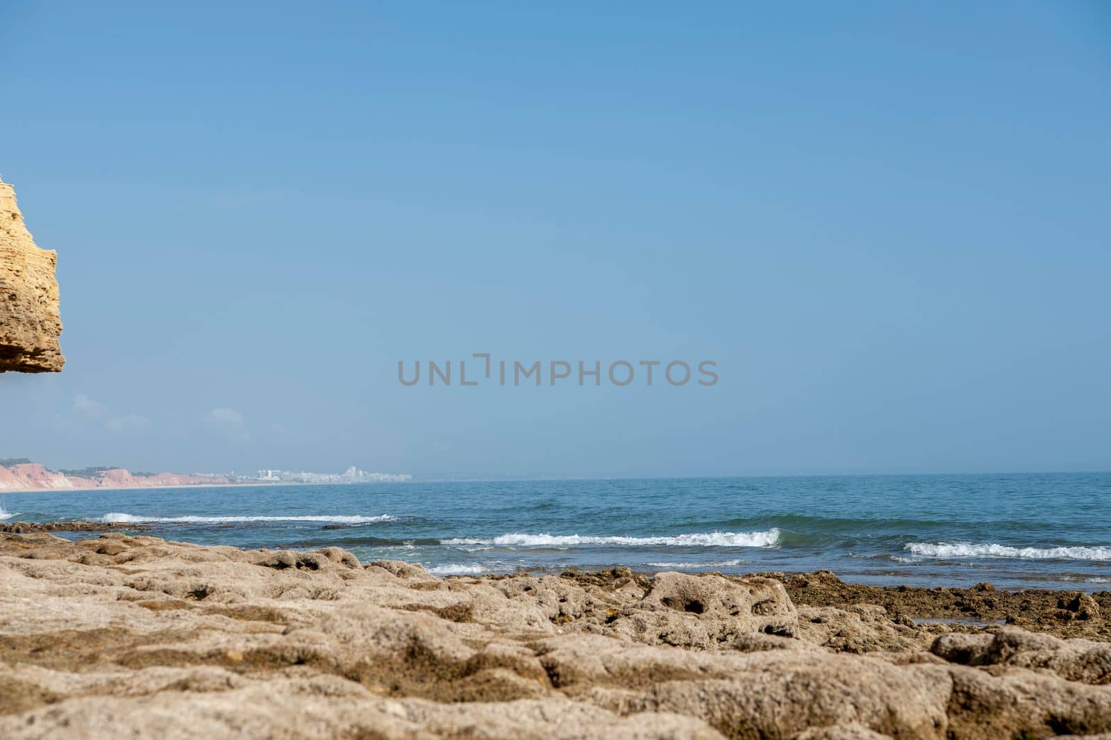Maria Luisa beach with rock formation in Albufeira, Algarve, Portugal.