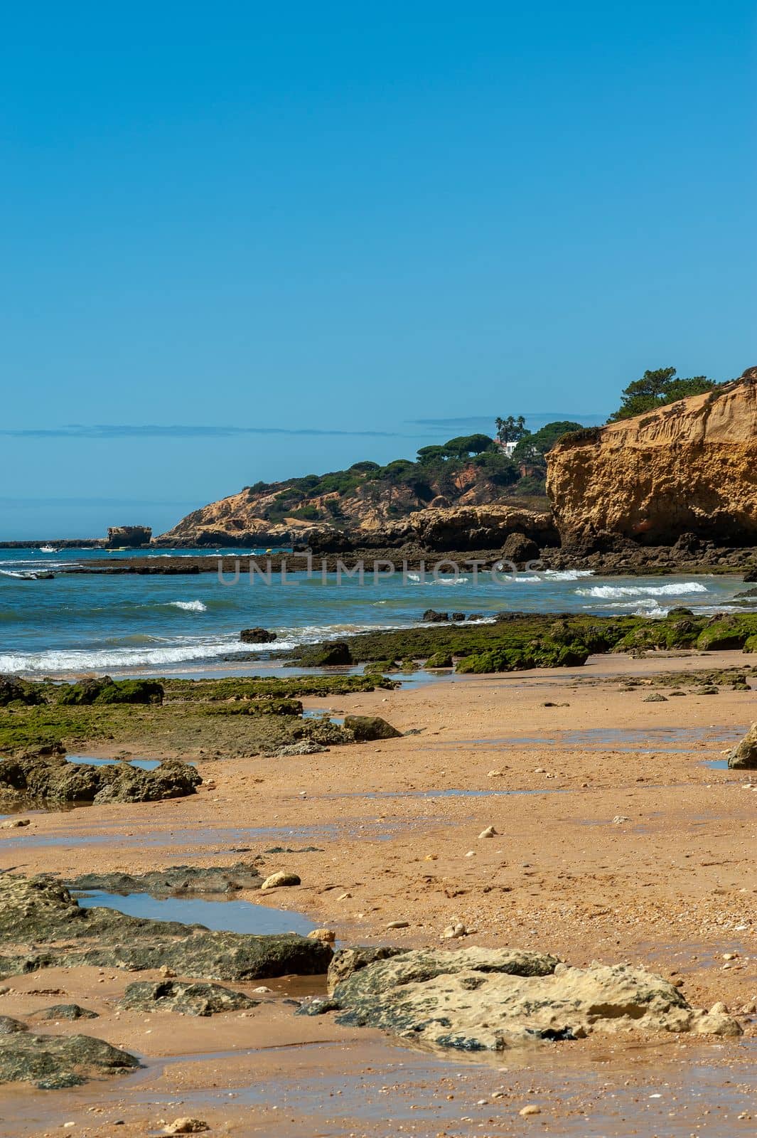 Maria Luisa beach with rock formation in Albufeira, Algarve, Portugal.