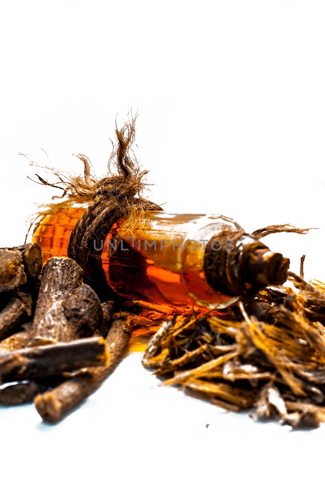 Ayurvedic herb Liquorice root,Licorice root, Mulethi or Glycyrrhiza glabra root and its powder with its oil for detoxifying the body, soothing spasms, easing menstrual cramps, raising blood pressure. by mirzamlk