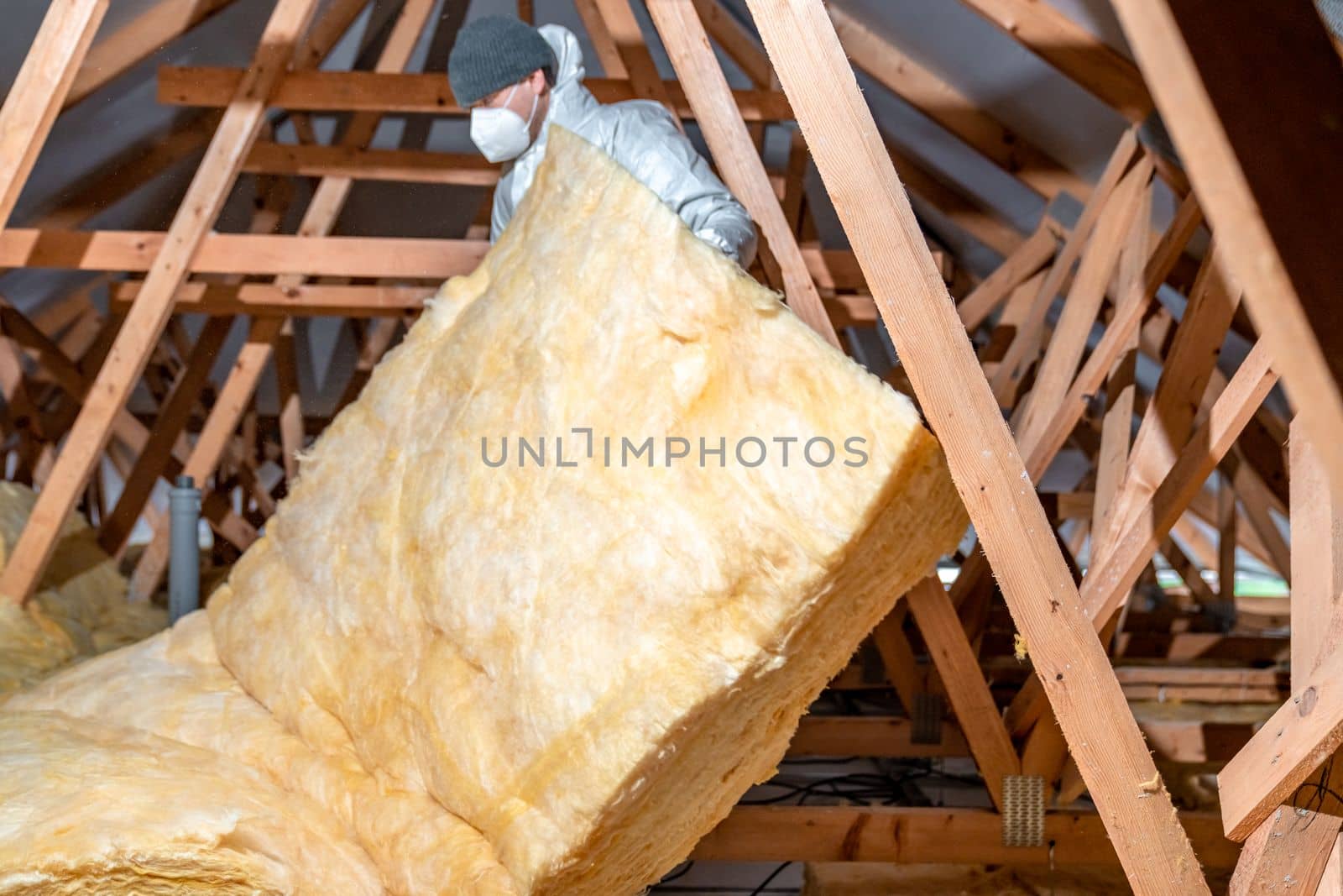 insulation of the roof and ceiling with glass wool.
