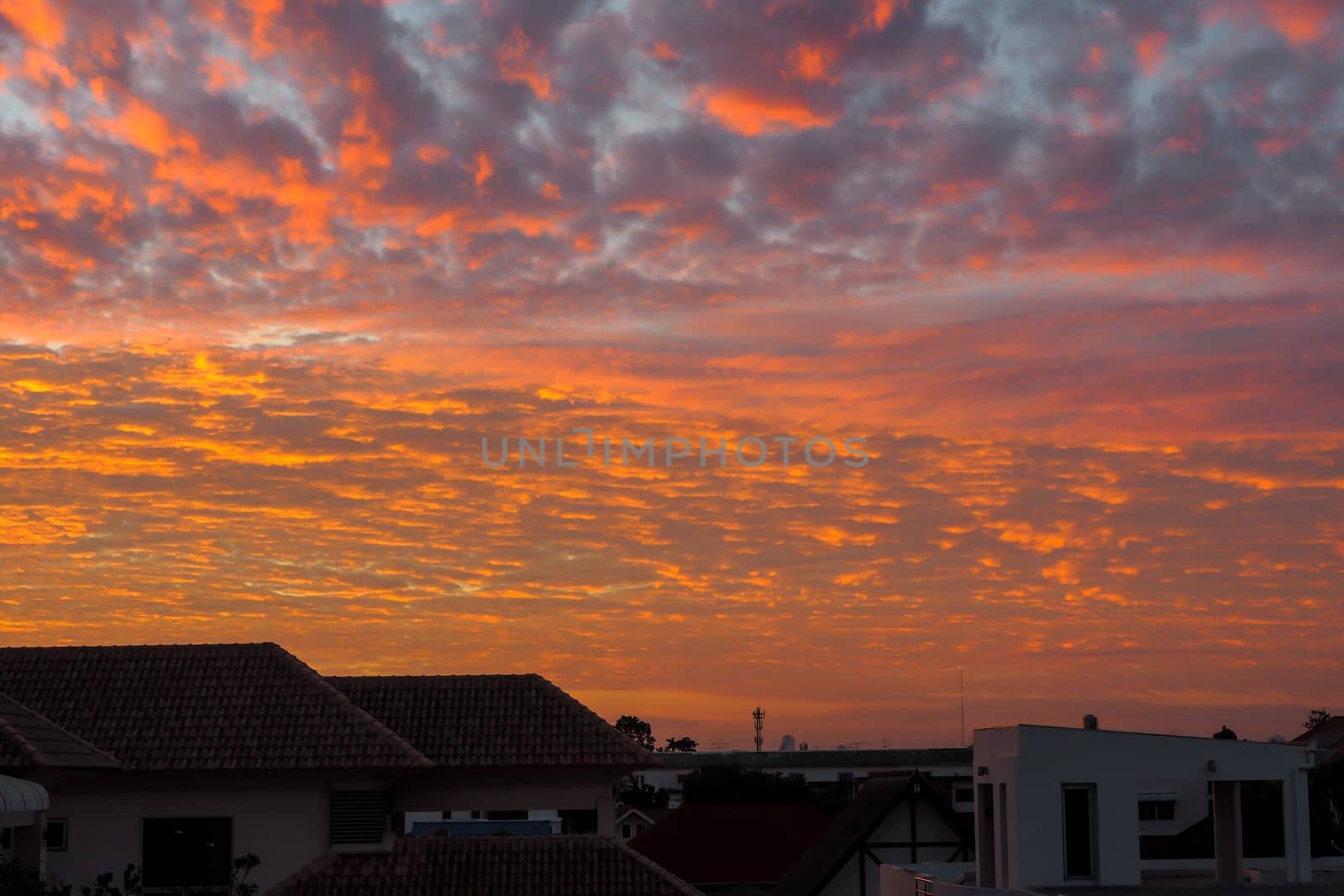 Red sky at morning, during sunrise by Satakorn