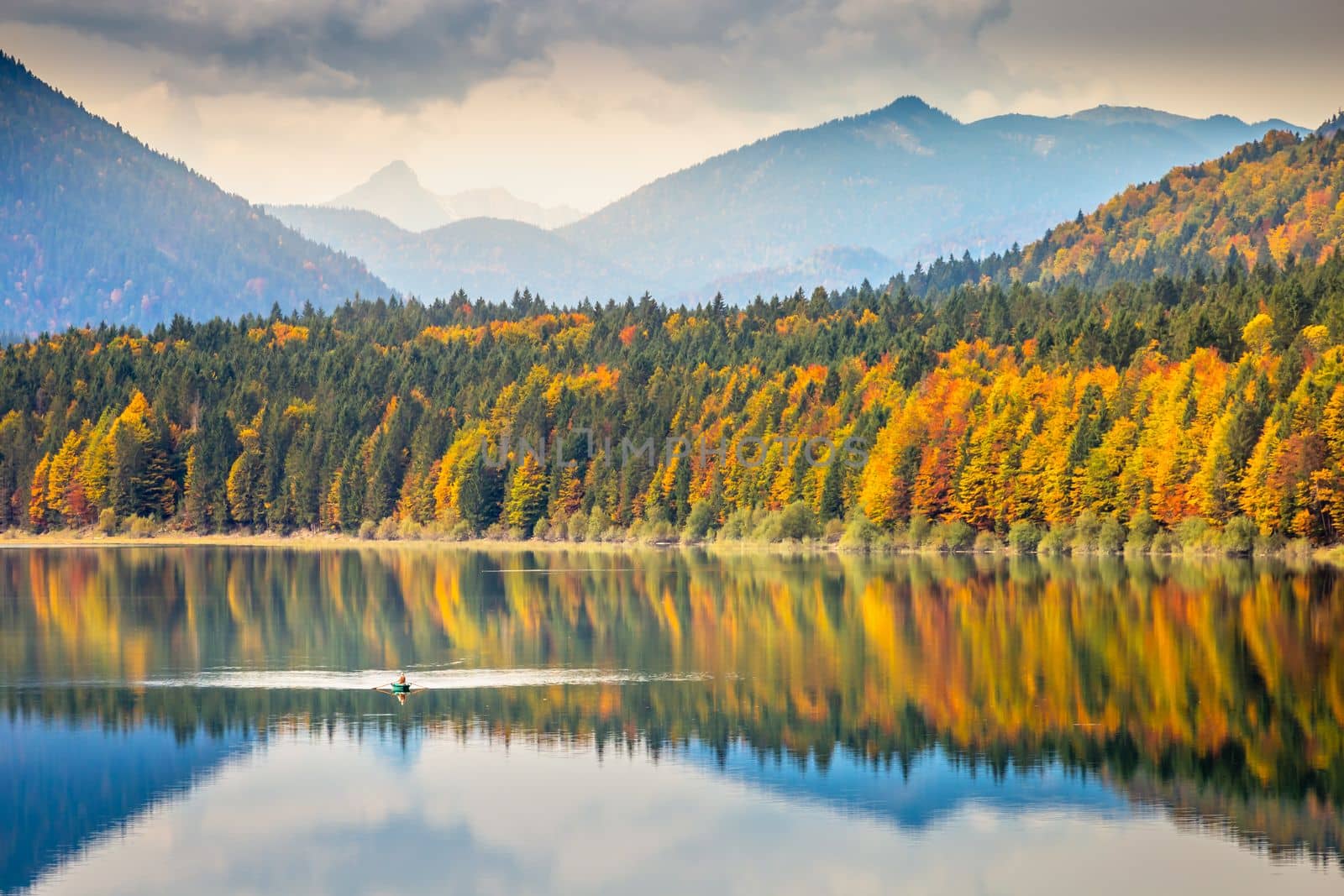 Alpsee lake reflection in Bavarian alps at golden autumn, Karwendel mountains, Bavaria, Germany