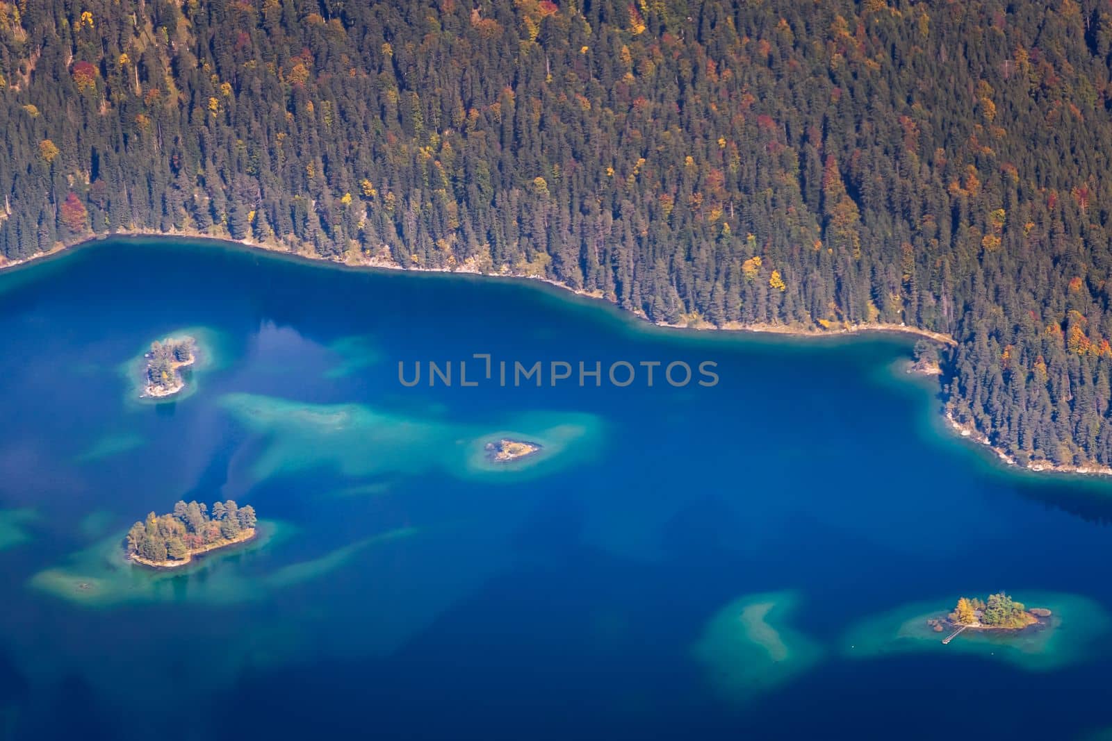 Eibsee lake from above Zugspitze at dramatic autumn landscape, Garmisch, Germany, border with Austria Tyrol