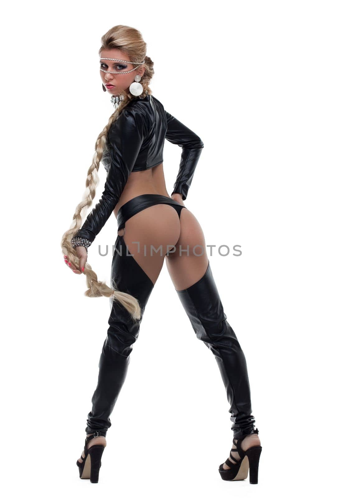 Full length portrait of woman in latex costume with braid. Isolated on white