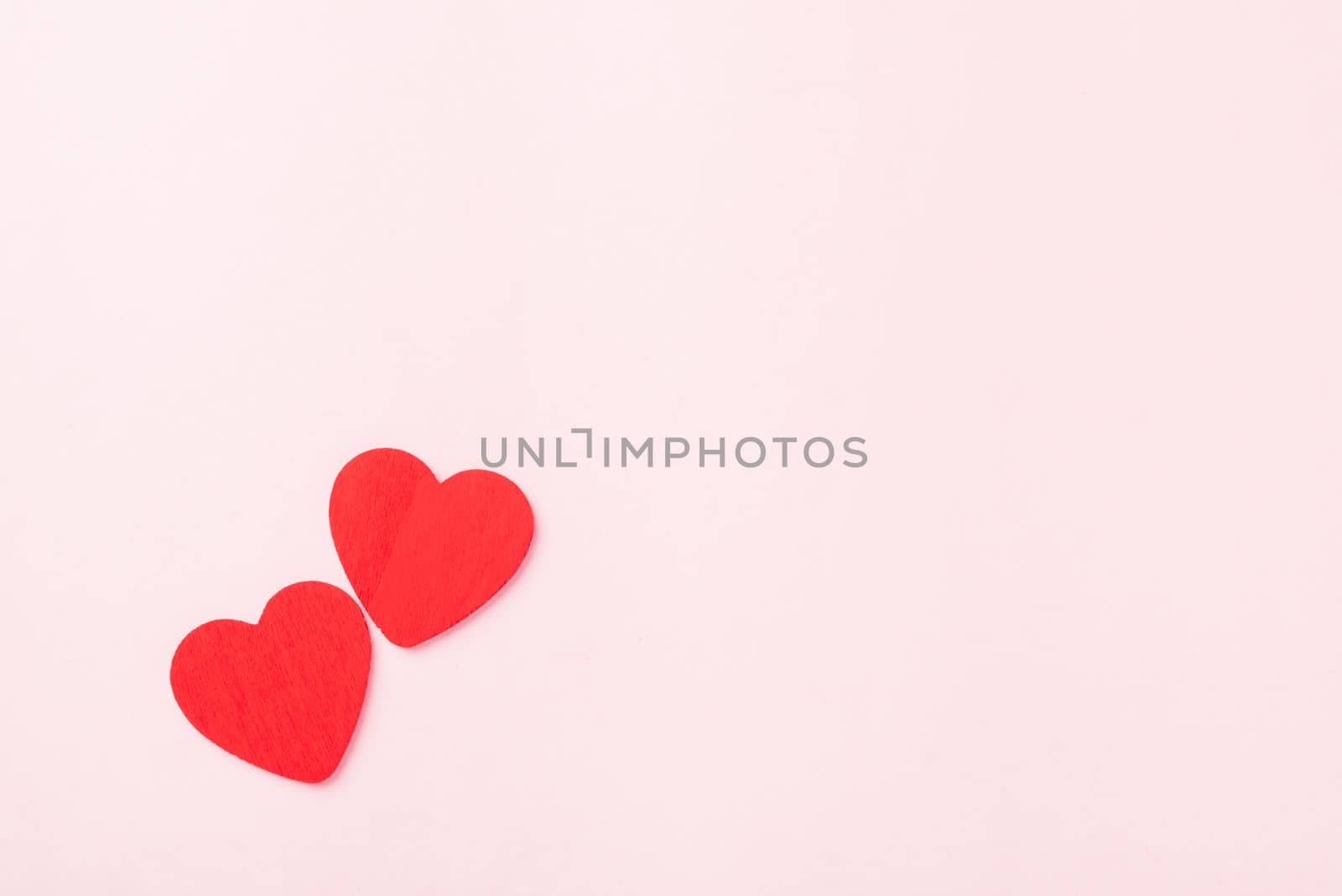 Valentines' day background. red hearts composition greeting card for love Valentines day concept isolated on pink background with copy space. Top View flat lay from above