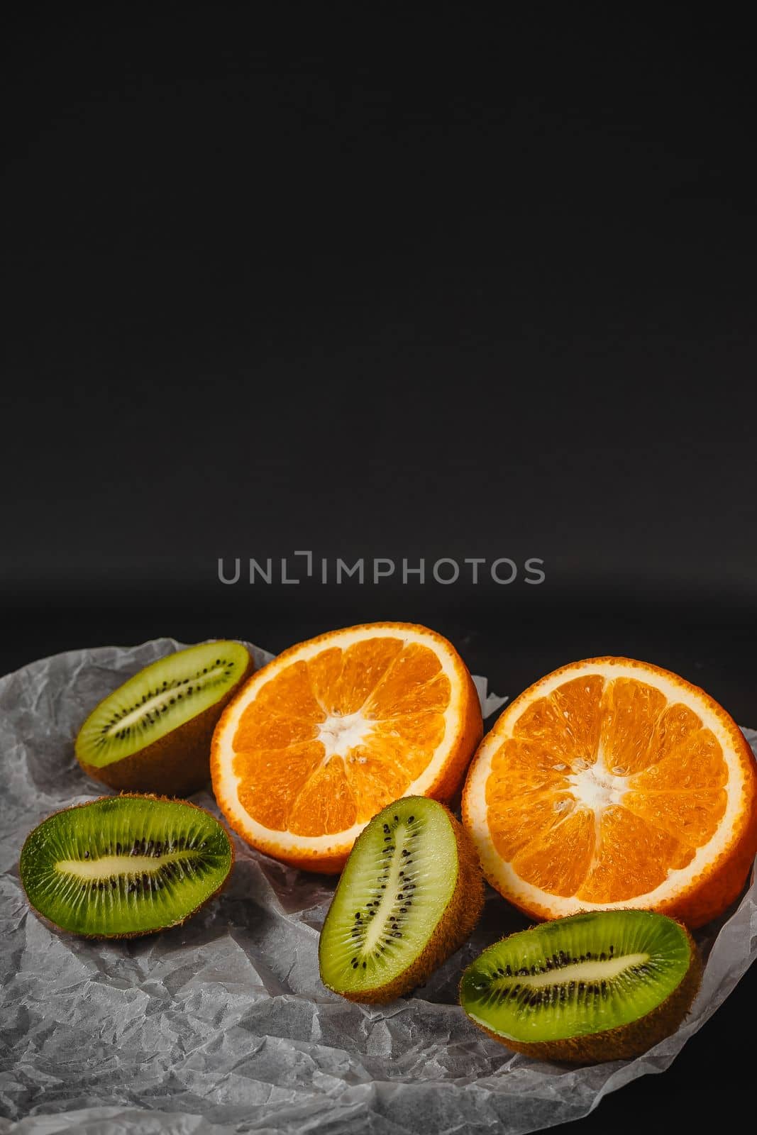 Luxurious fruit background. Studio photography of various fruits isolated on black background. Copy space. high resolution product