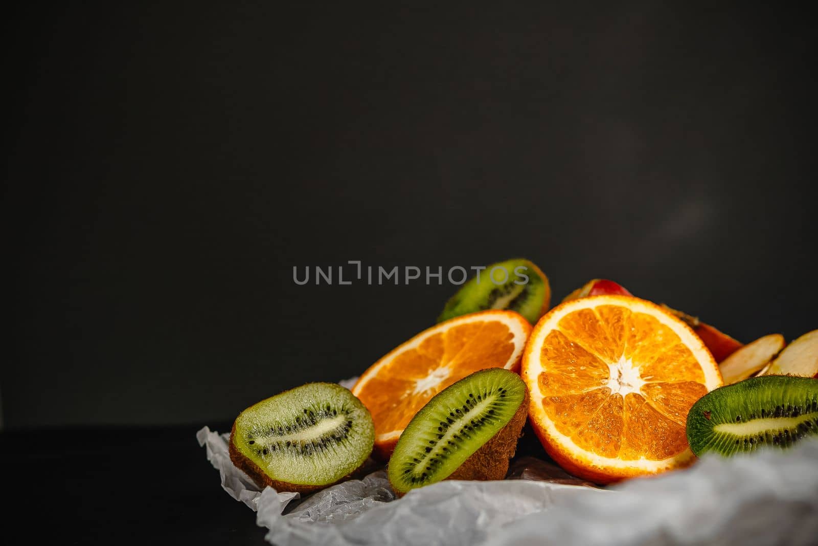 Luxurious fruit background. Studio photography of various fruits isolated on black background. Copy space. high resolution product