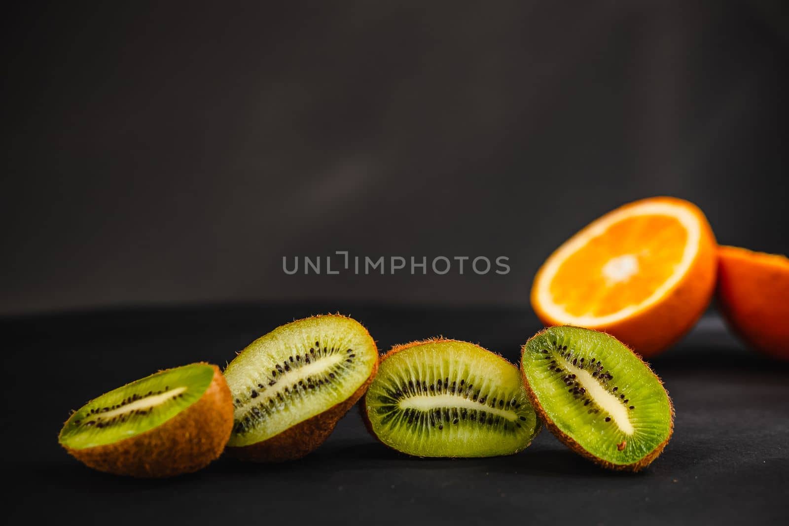 Luxurious fruit background. Studio photography of various fruits isolated on black background. Copy space. high resolution product