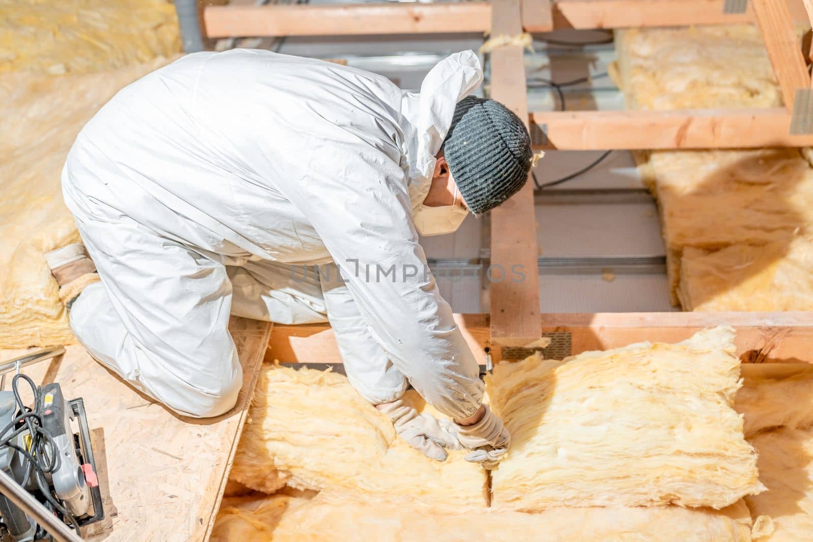 insulation of the roof and ceiling with glass wool.