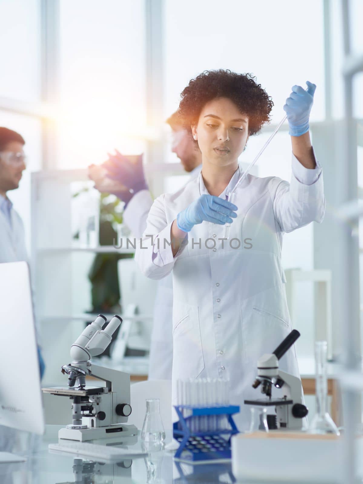 Scientists smiling together in lab