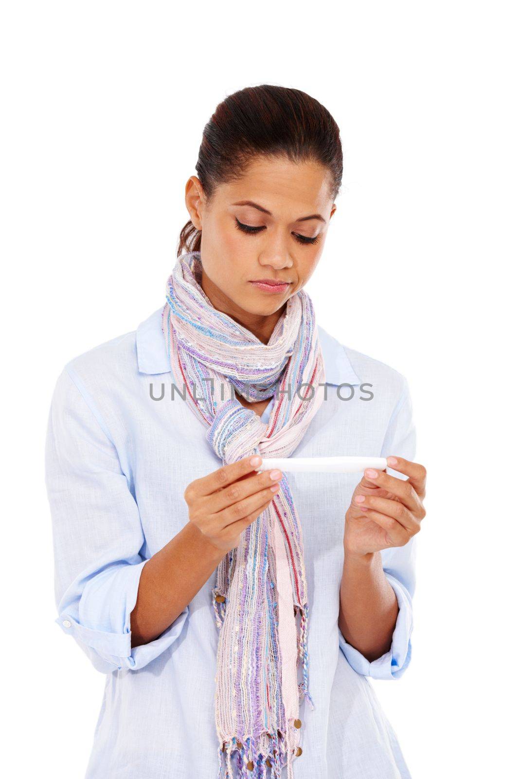 Depression, sad and woman with pregnancy test in studio isolated on a white background. Pregnant, infertility and female looking at maternity exam results feeling disappointed, unhappy and depressed