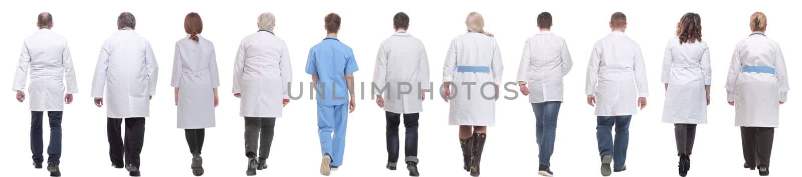 group of doctors in motion isolated on white background