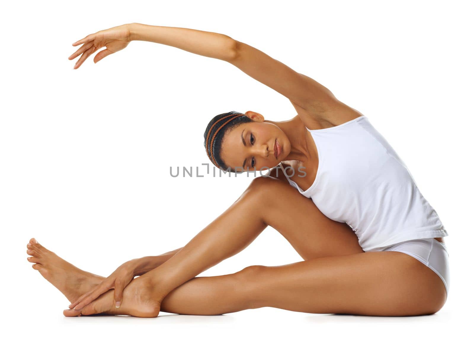 Stretching arms, yoga and woman training for body exercise on a white background in studio. Fitness start, ballet focus and athlete with a warm up during a pilates workout on a studio background.