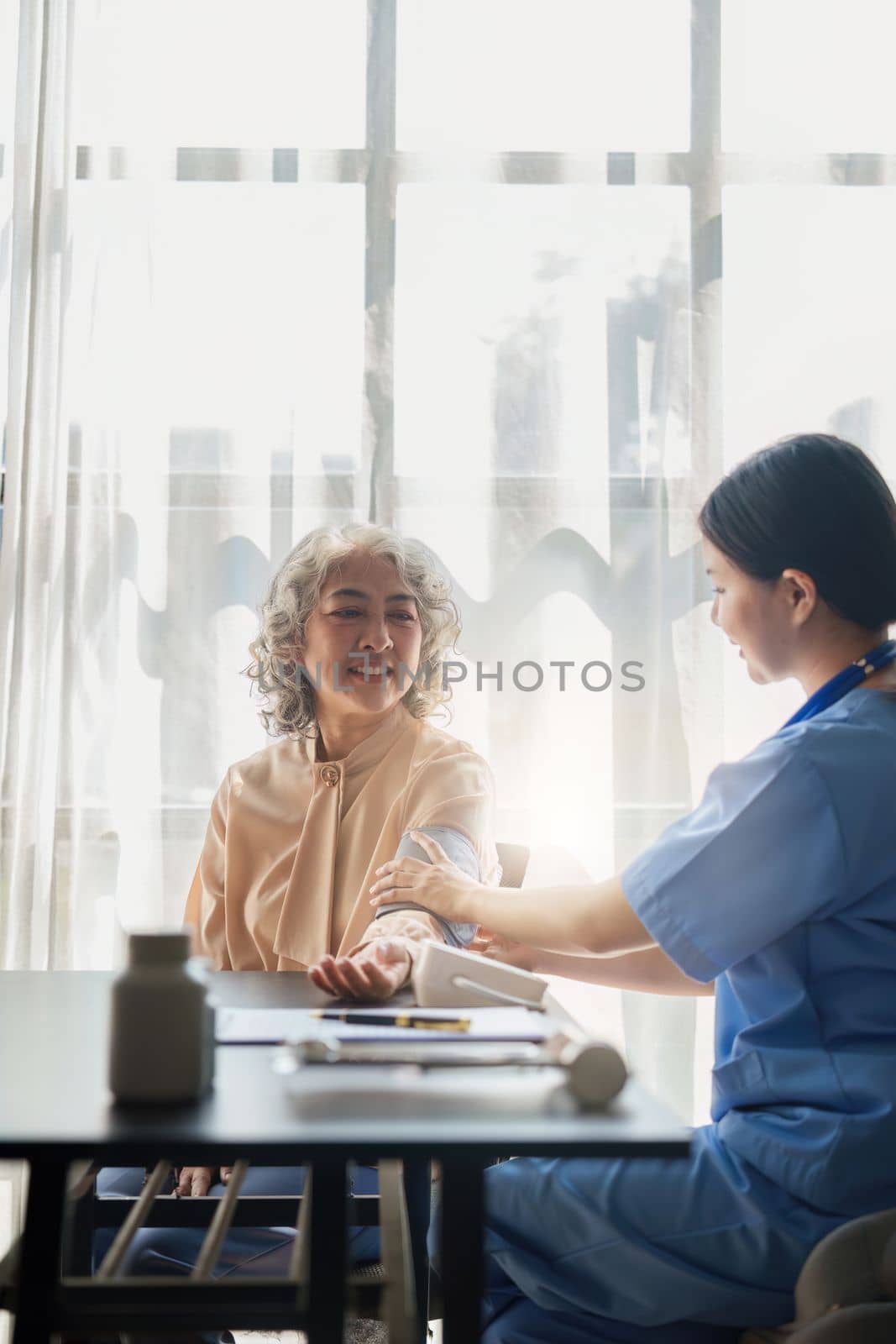 Home healthcare nurse, physical therapy with senior adult woman at home by itchaznong