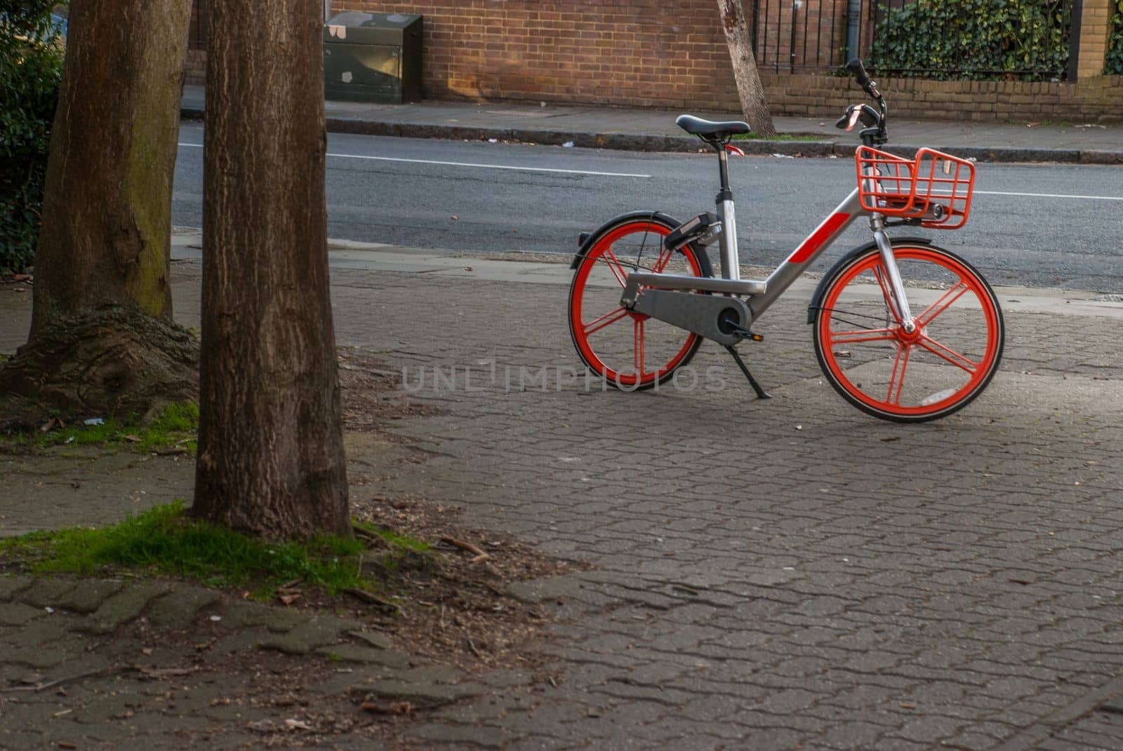 London, UK - Feb 22, 2019 : Red Bike Silver on the road, isolated on the road in London
