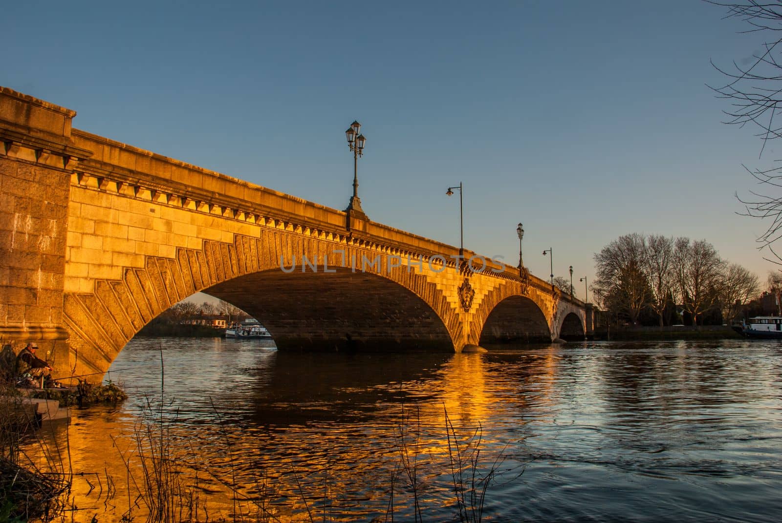 London, UK - Feb 22, 2019 :  Bridge in west London, listed bridge over the river Thames