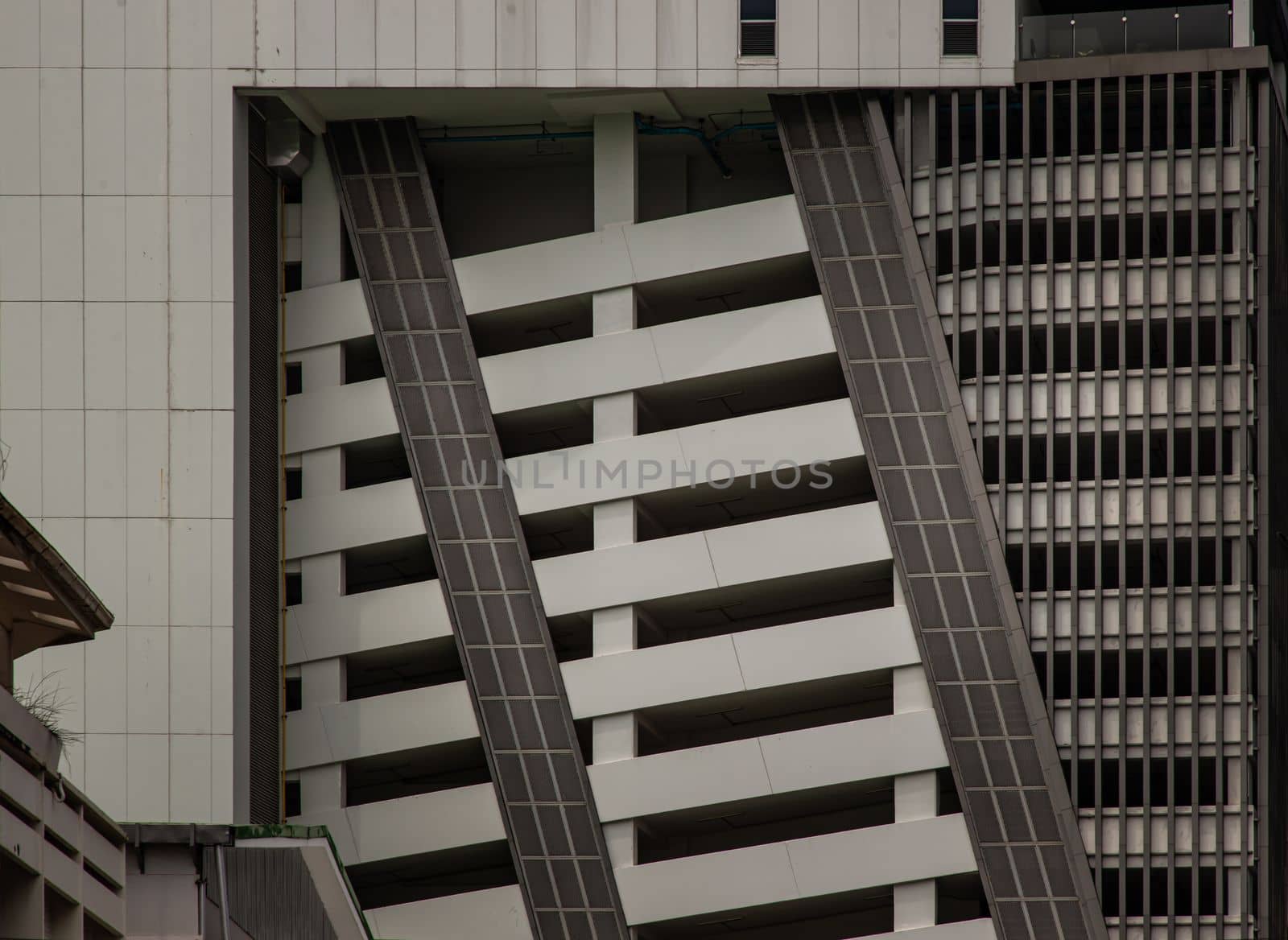 Bangkok, thailand - Mar 18, 2022 : Structure pattern of Repeating structure of Exterior multi wall at parking lot building. Architecture concept, Selective focus.