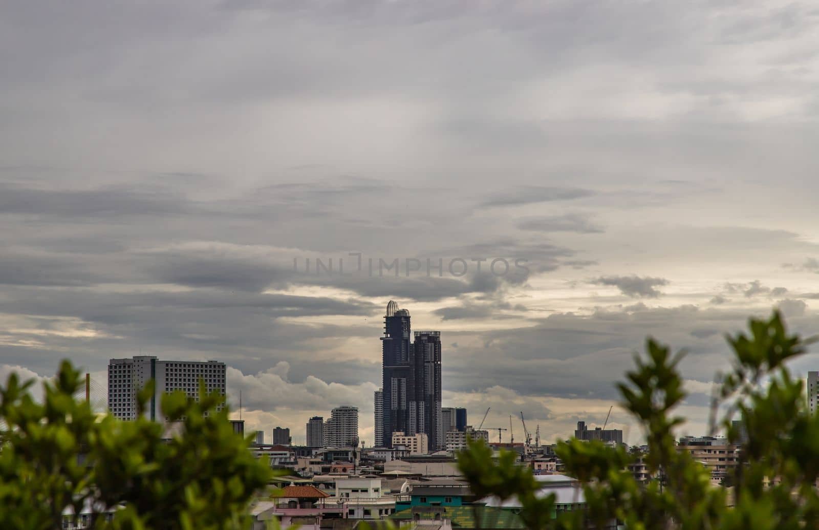 Bangkok downtown cityscape with skyscrapers at evening give the city a modern style. Selective focus.