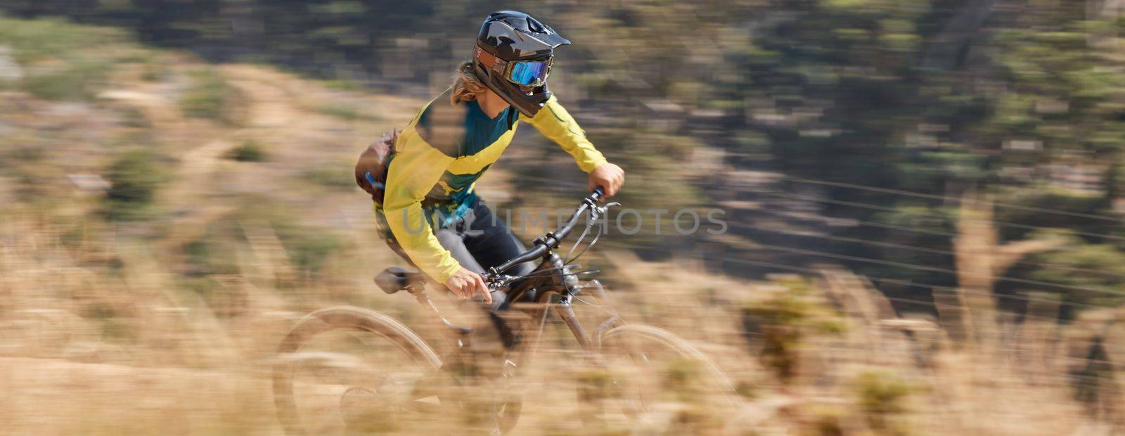 Speed cycling, mountain bike and man travel on nature path for outdoor exercise, training workout or marathon race. Freedom, sports adventure and bicycle cyclist on fast journey for fitness workout.