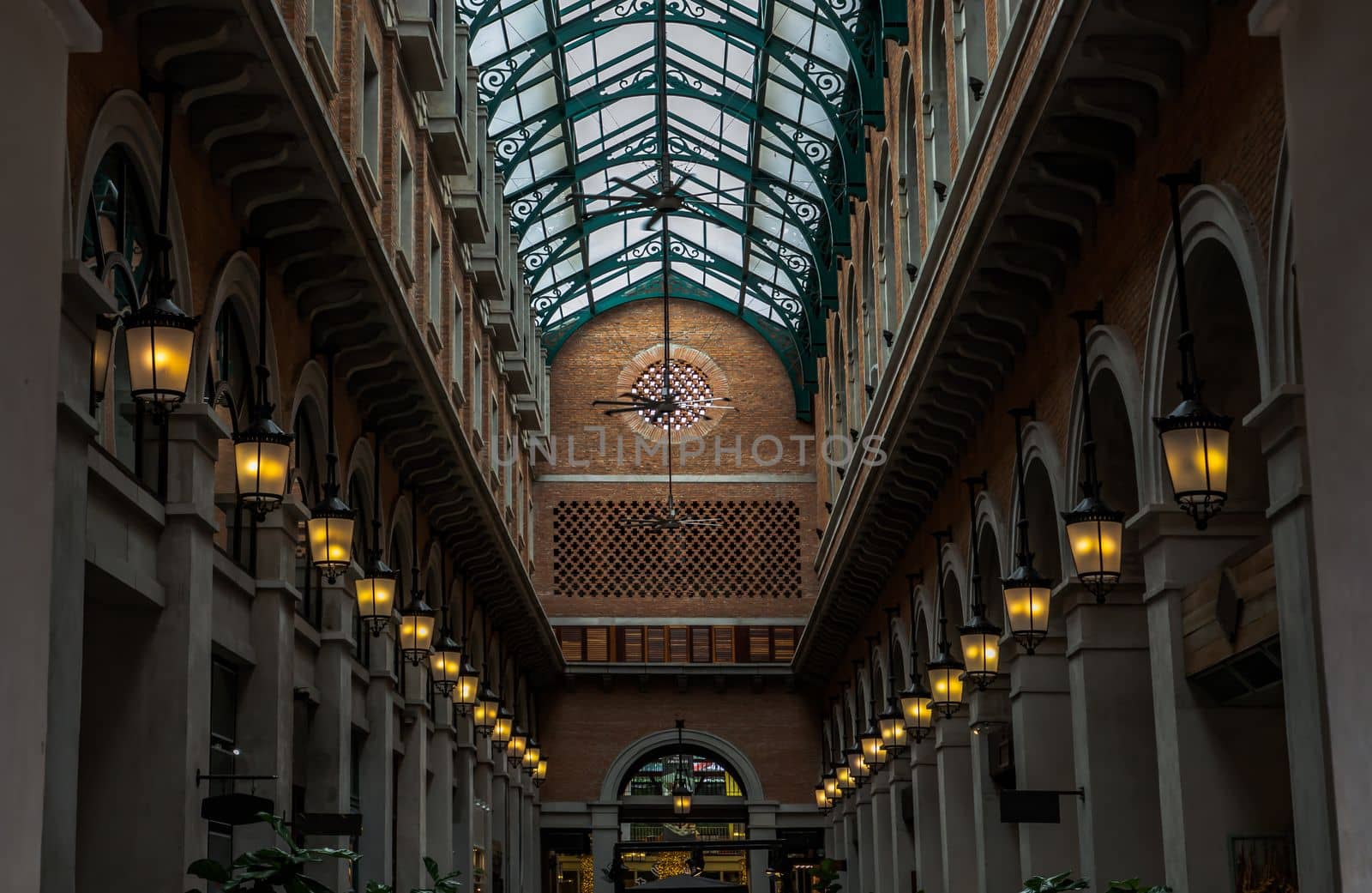 Chiang Mai,Thailand - Sep 08, 2020 : Interior view of Retro vintage building and brick wall with glass roof featuring offices, restaurants, Focus and blur.