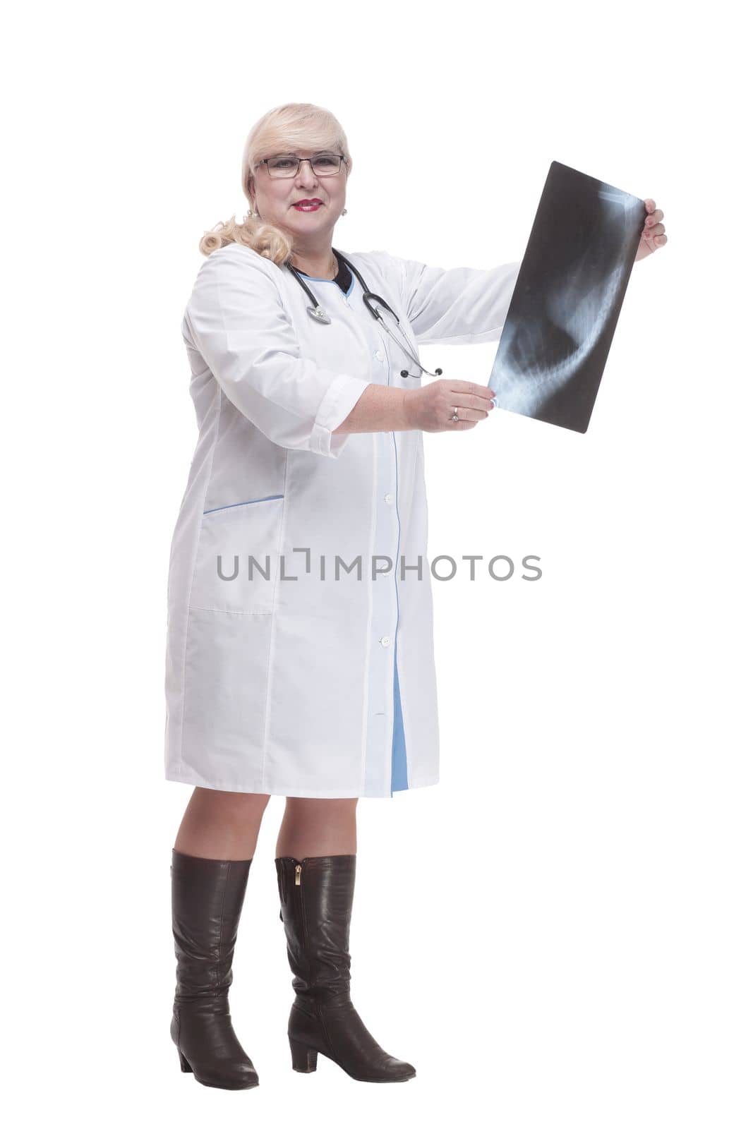 in full growth. female doctor with an x-ray . isolated on a white background.