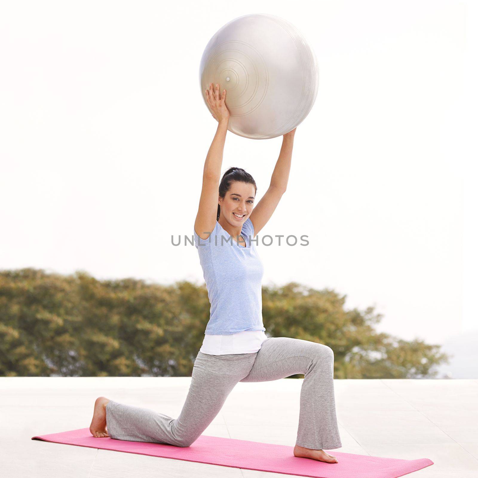 Your health is your greatest gift. Full length portrait of a young woman doing yoga outdoors