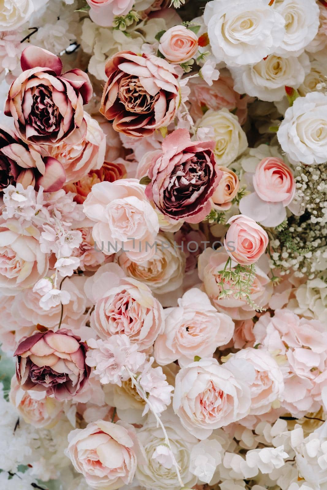 Close-up of wedding flowers.Background of pink and white roses.