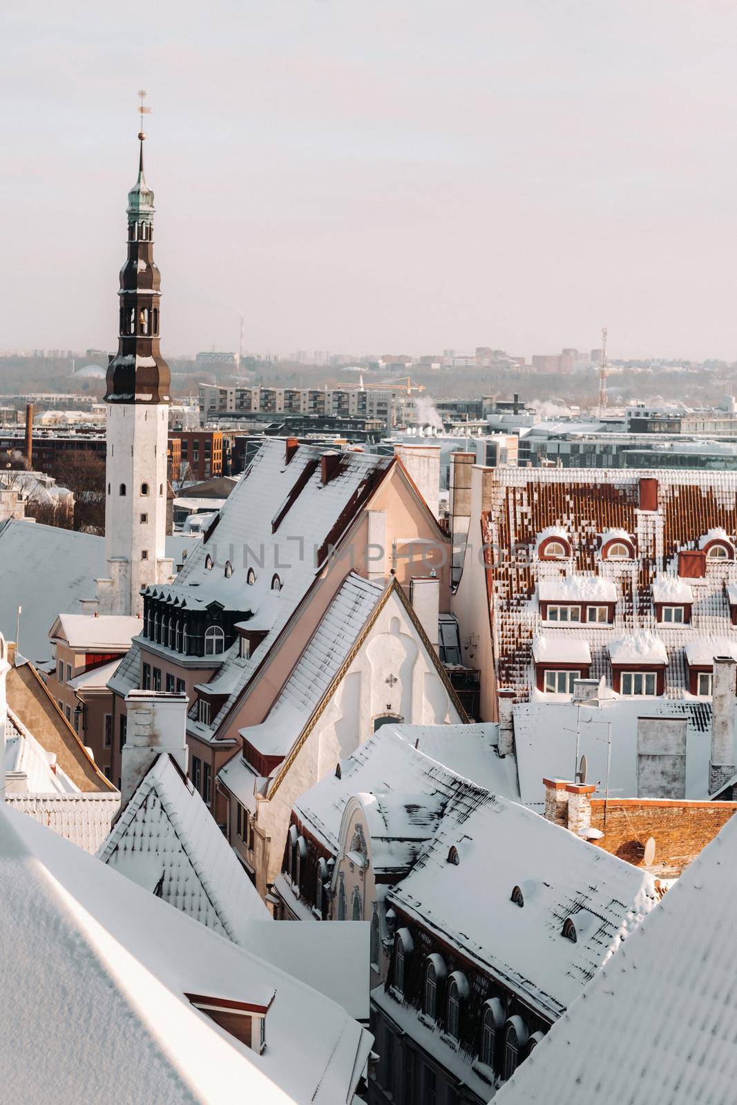 Winter View of the old town of Tallinn.Snow-covered city near the Baltic sea. Estonia by Lobachad