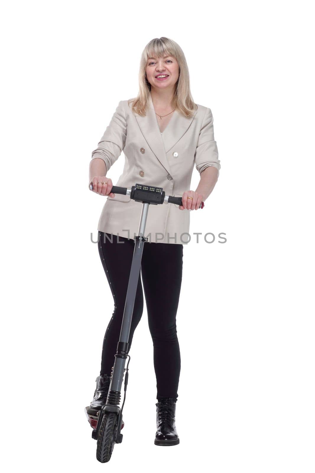 in full growth. smiling adult woman with an electric scooter . isolated on a white background.