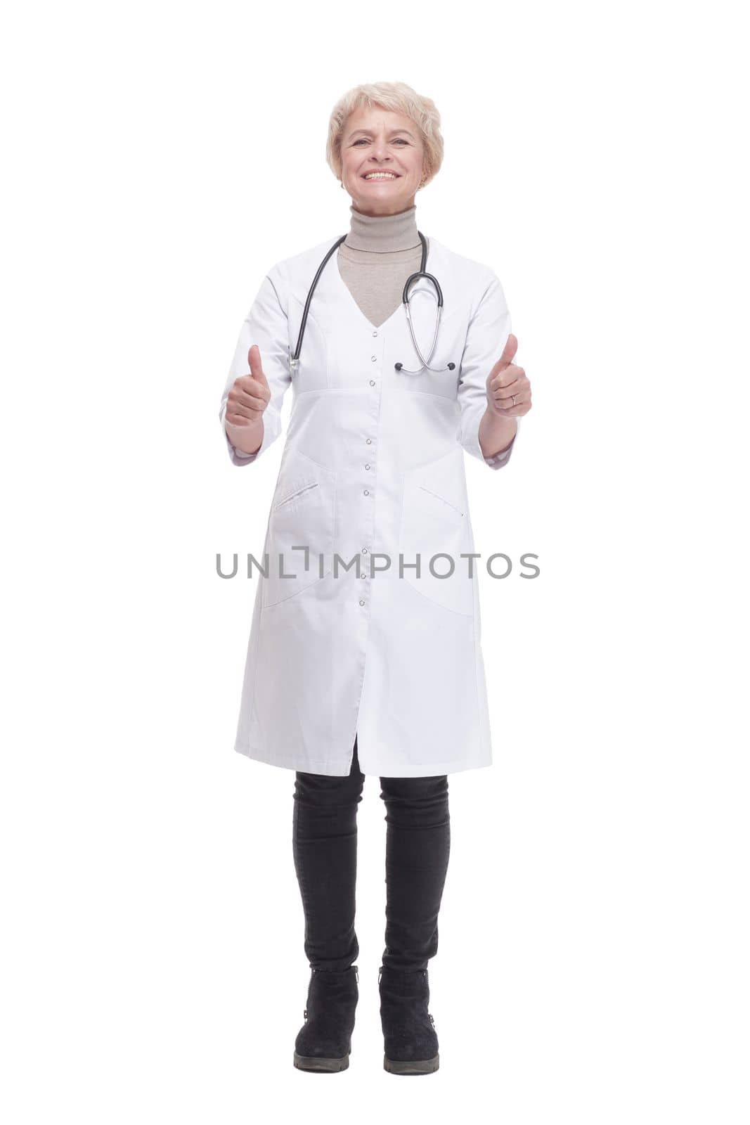 in full growth. smiling woman doctor showing thumbs up. isolated on a white background.